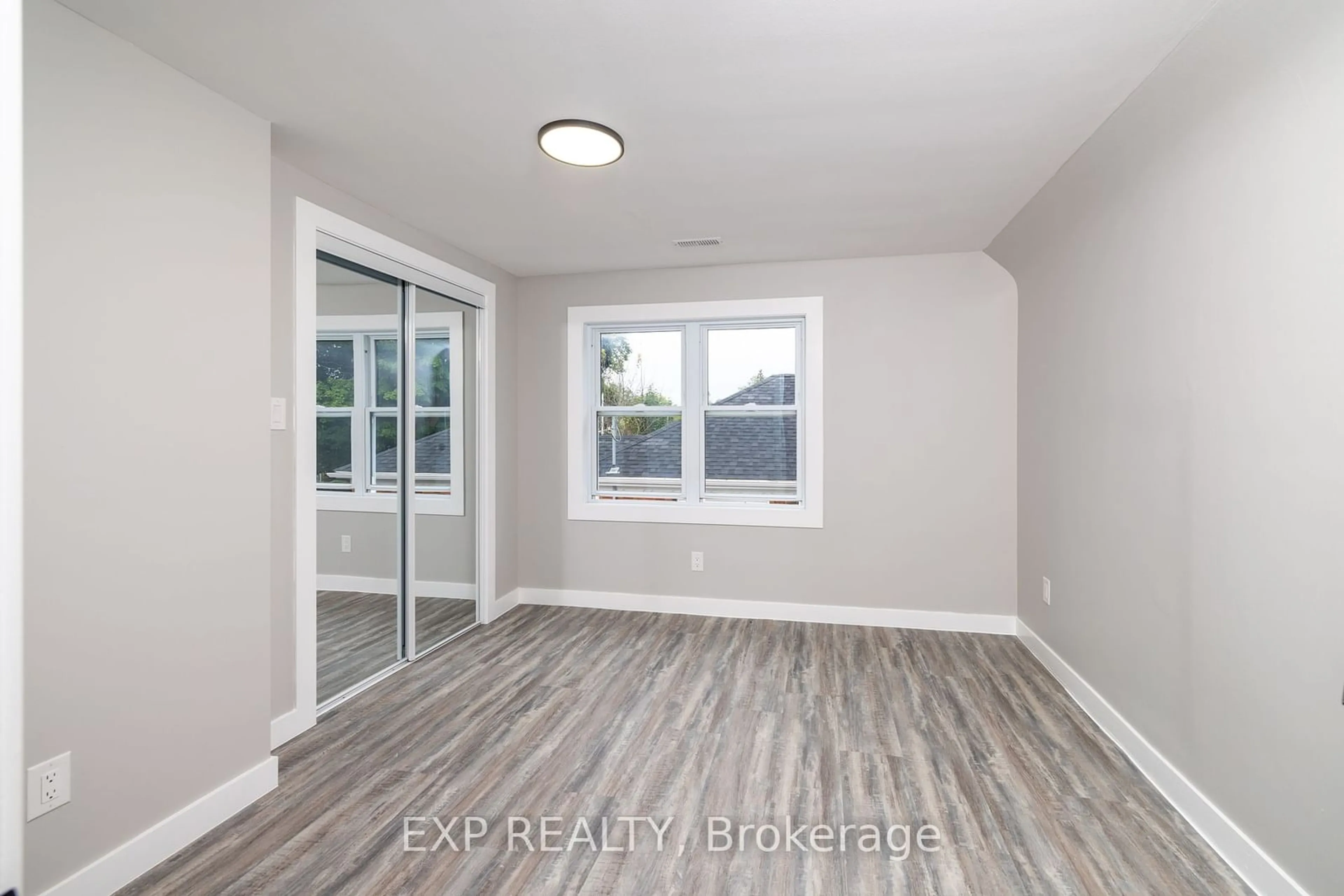 A pic of a room, wood floors for 9 Gunn St, Barrie Ontario L4M 2H2