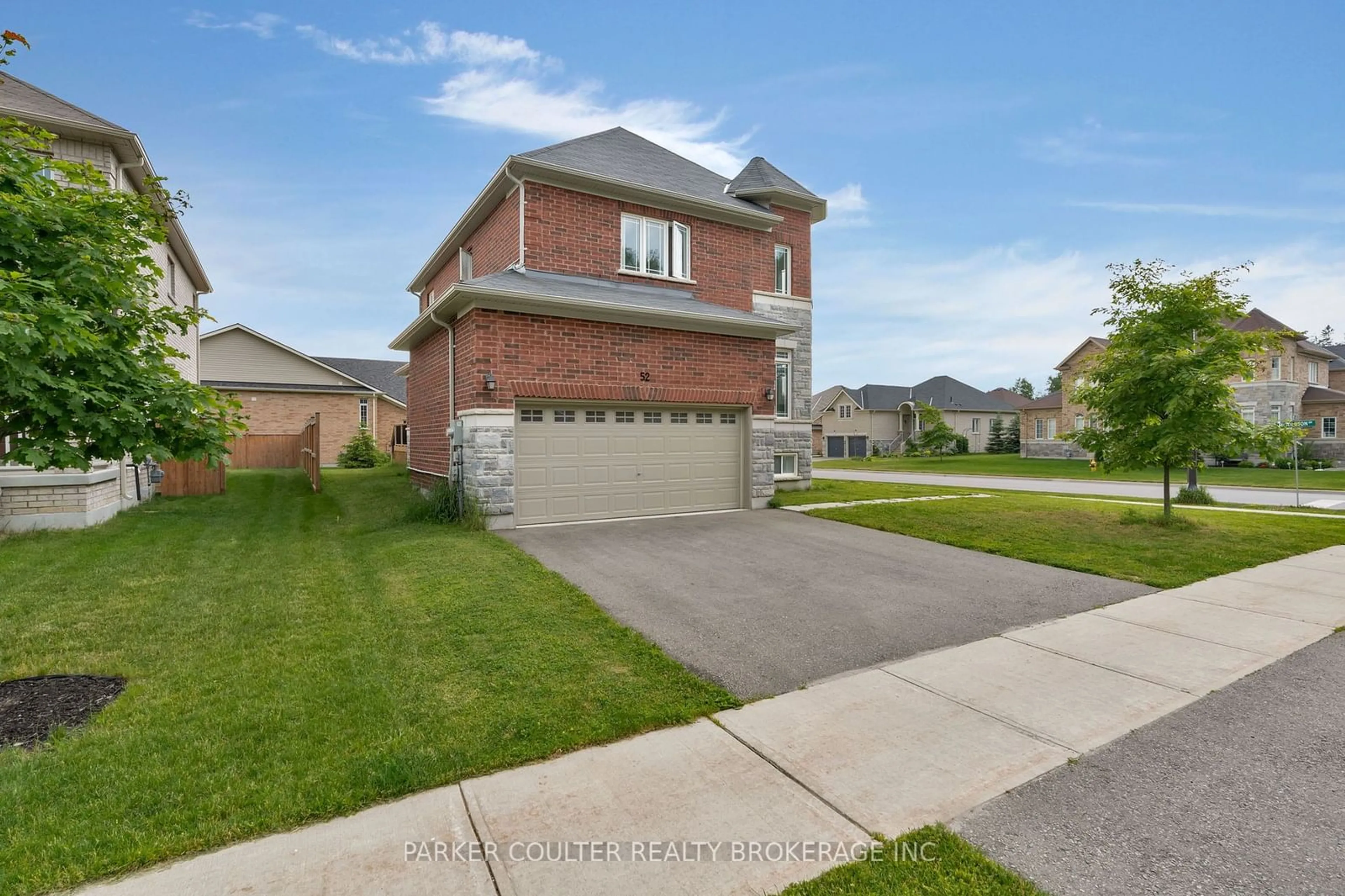 Frontside or backside of a home, the street view for 52 Pearl St, Wasaga Beach Ontario L9Z 0G8