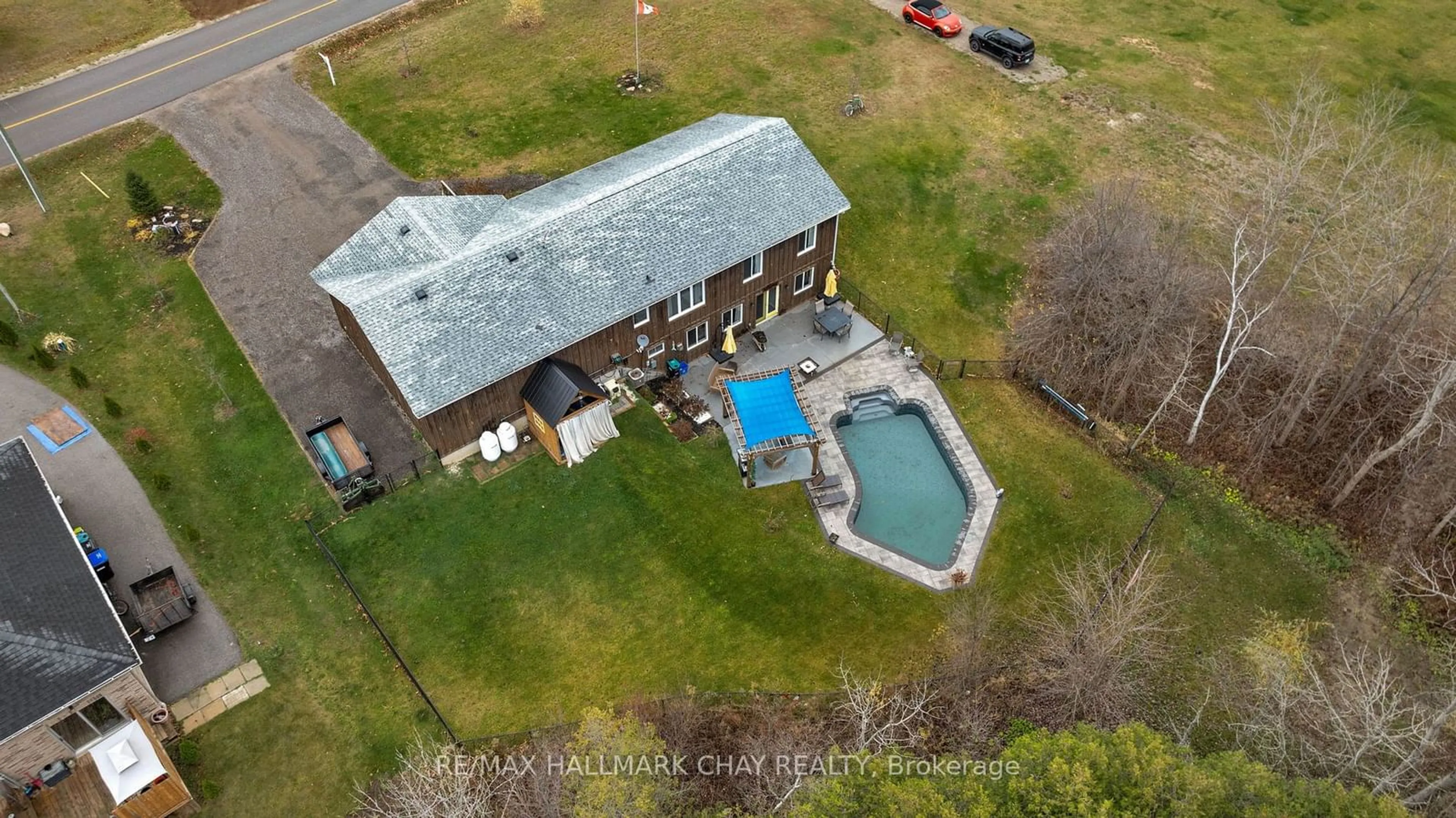 Frontside or backside of a home, the fenced backyard for 4193 Hogback Rd, Clearview Ontario L0M 1K0