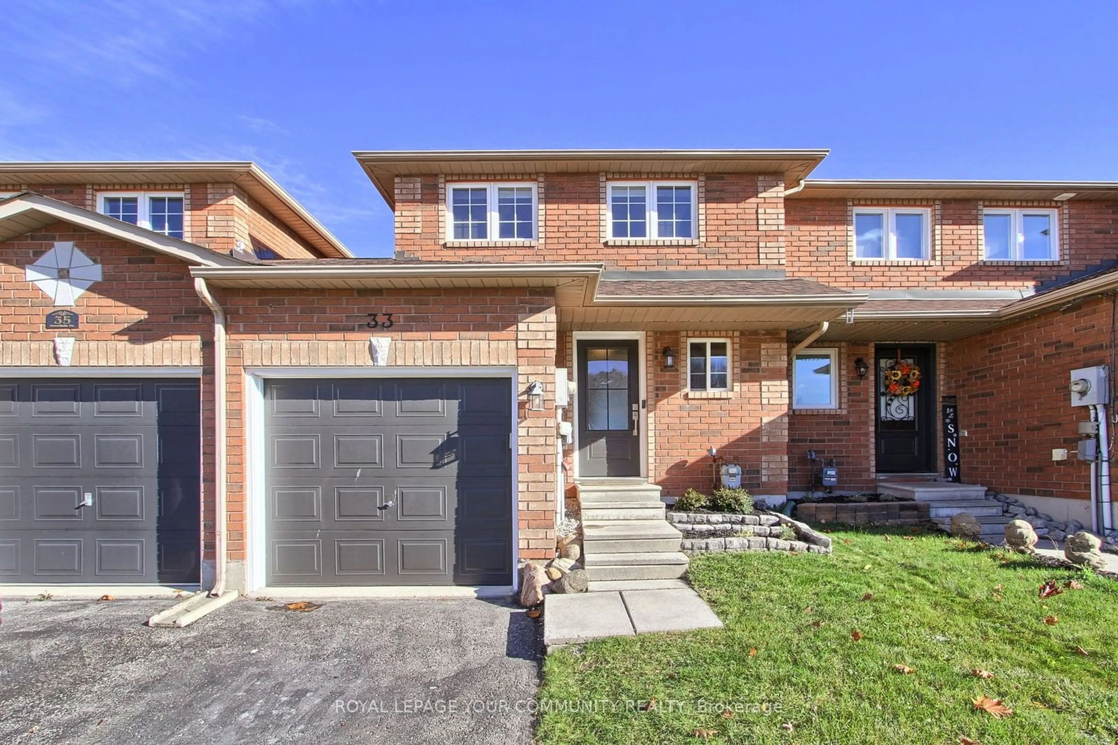 Home with brick exterior material for 33 Goodwin Dr, Barrie Ontario L4N 5Z7