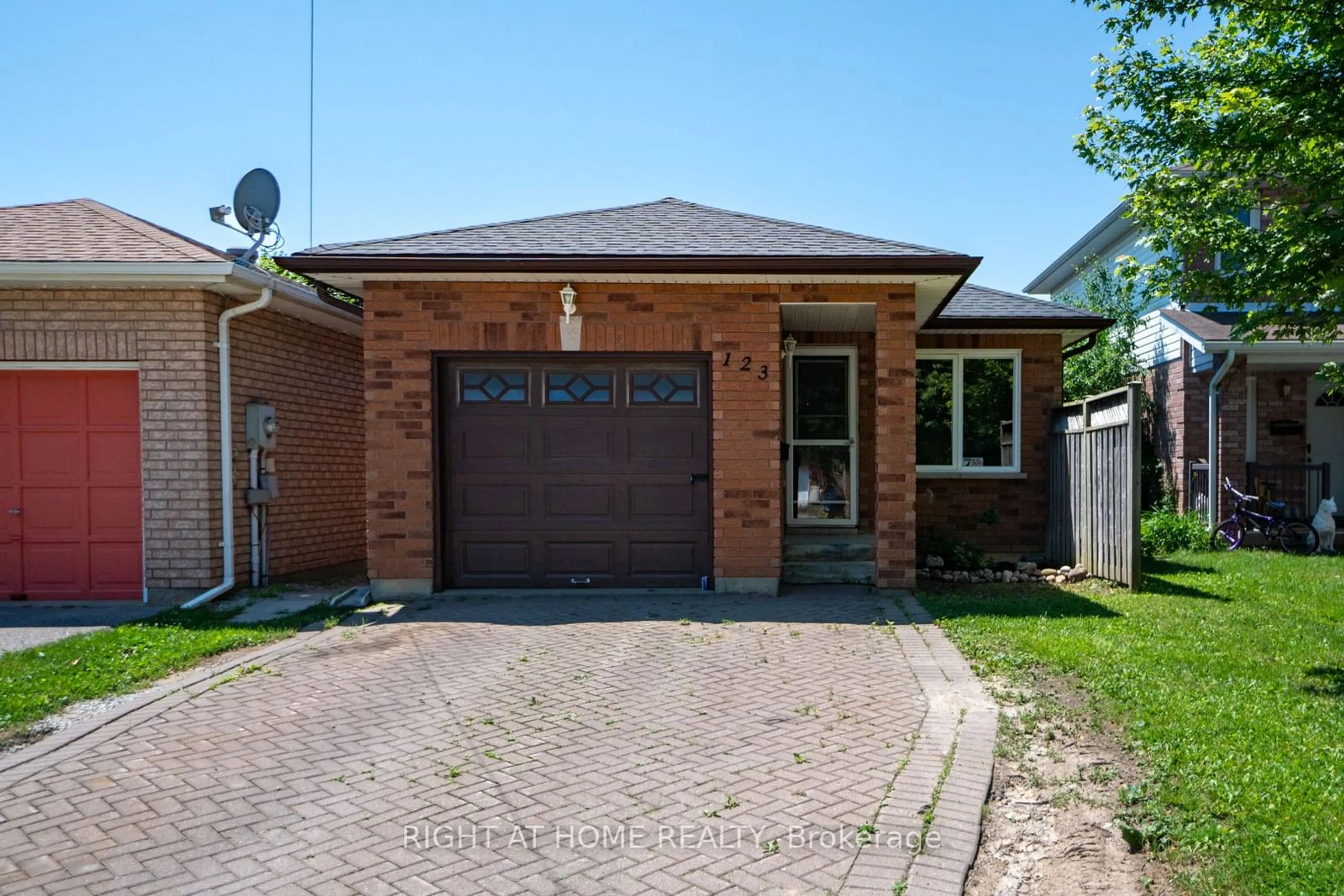 Home with brick exterior material for 123 Benson Dr ##1 & #2, Barrie Ontario L4N 7Y4