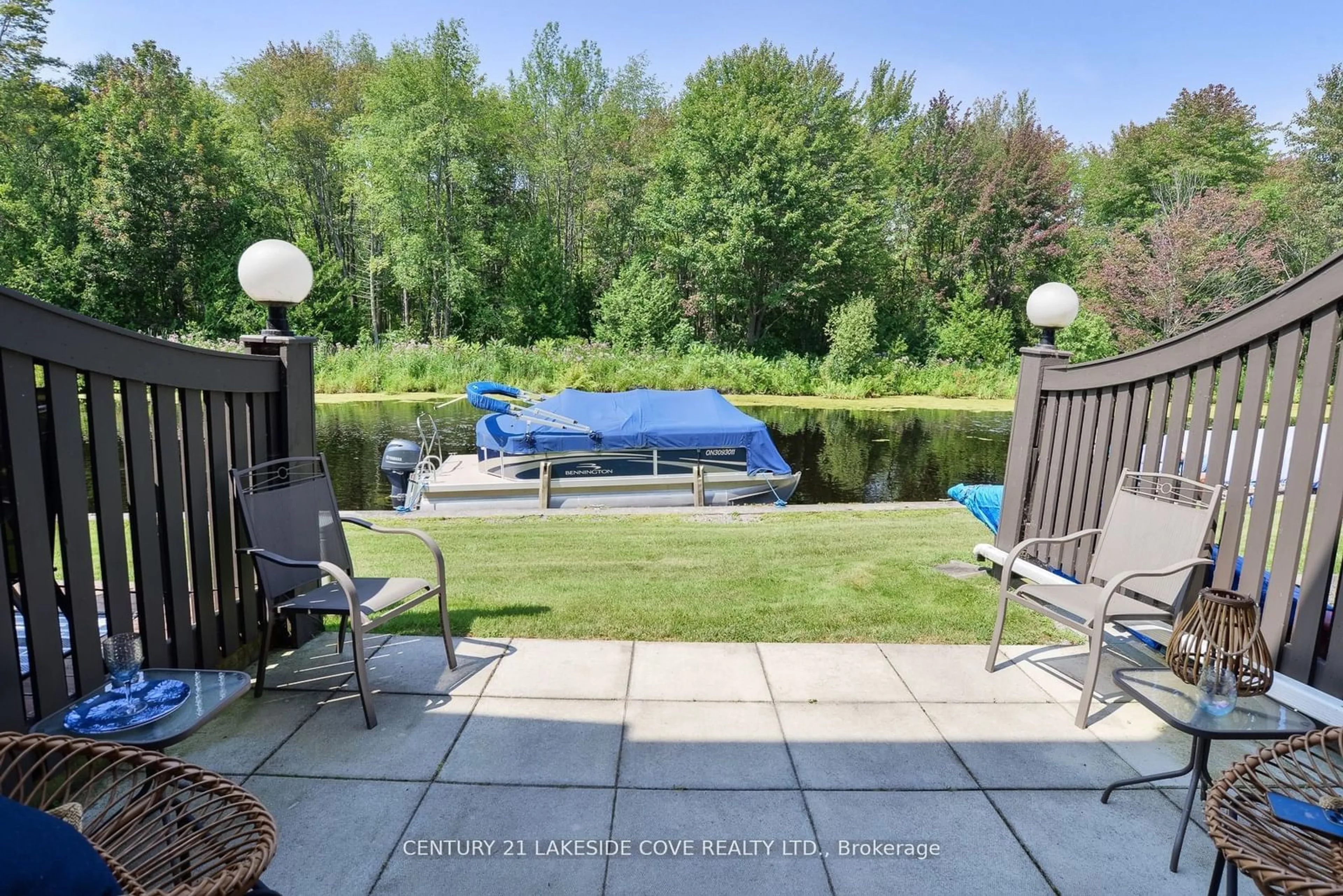 Patio, the fenced backyard for 2 Paradise Blvd #Unit 16, Ramara Ontario L0K 1B0