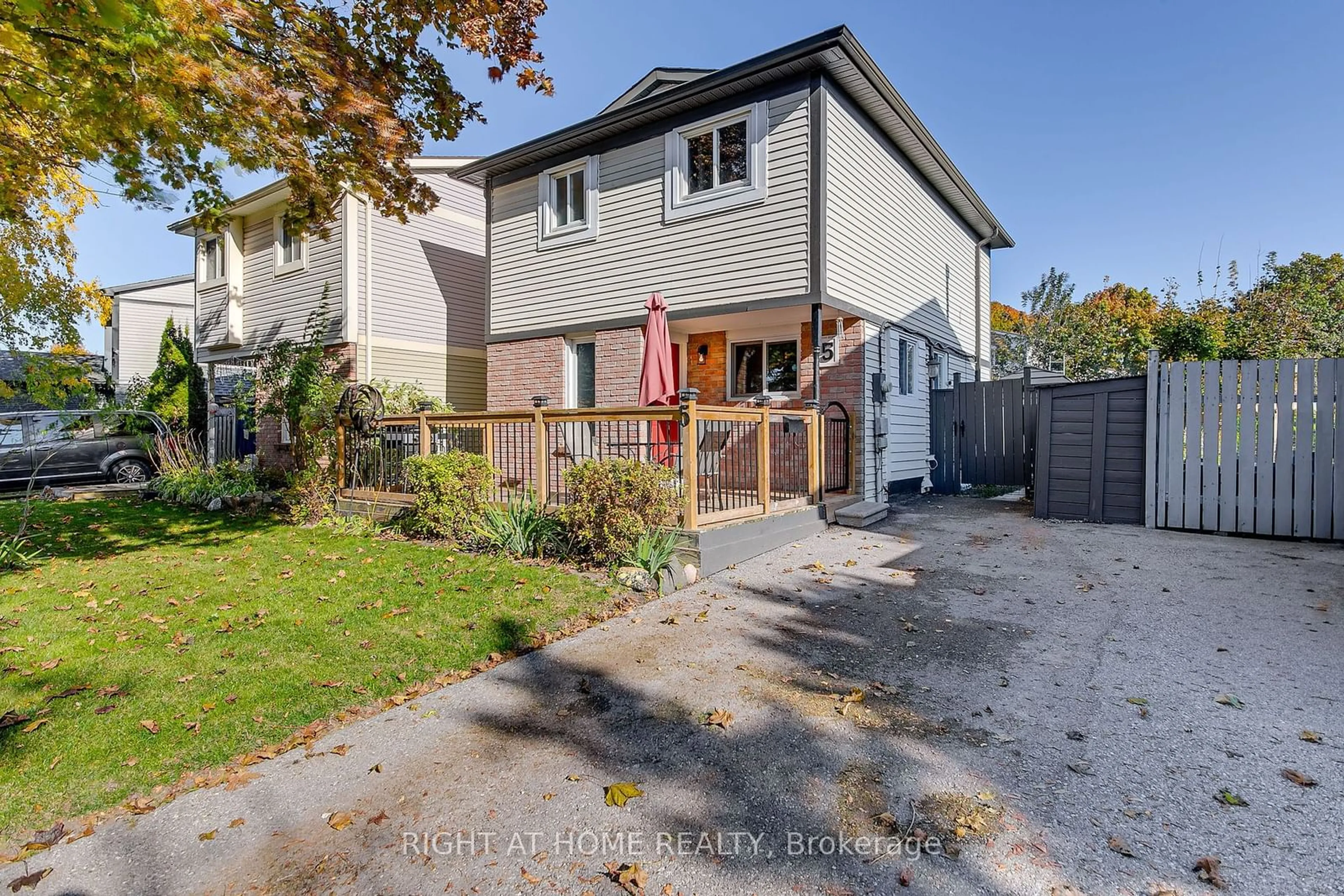 Frontside or backside of a home, the fenced backyard for 5 Dickens Dr, Barrie Ontario L4N 5C4