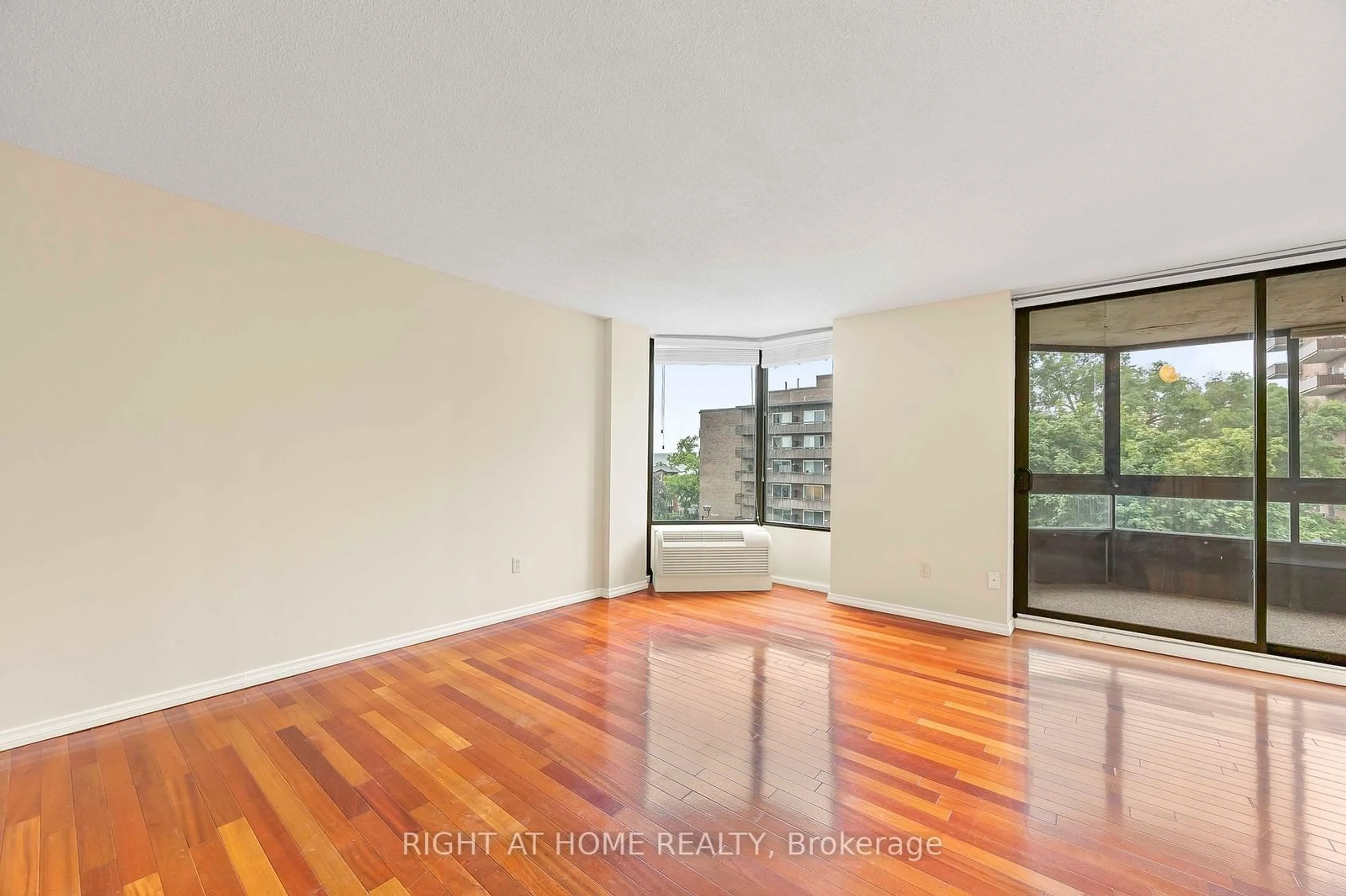 A pic of a room, wood floors for 181 Collier St #304, Barrie Ontario L4M 5L6