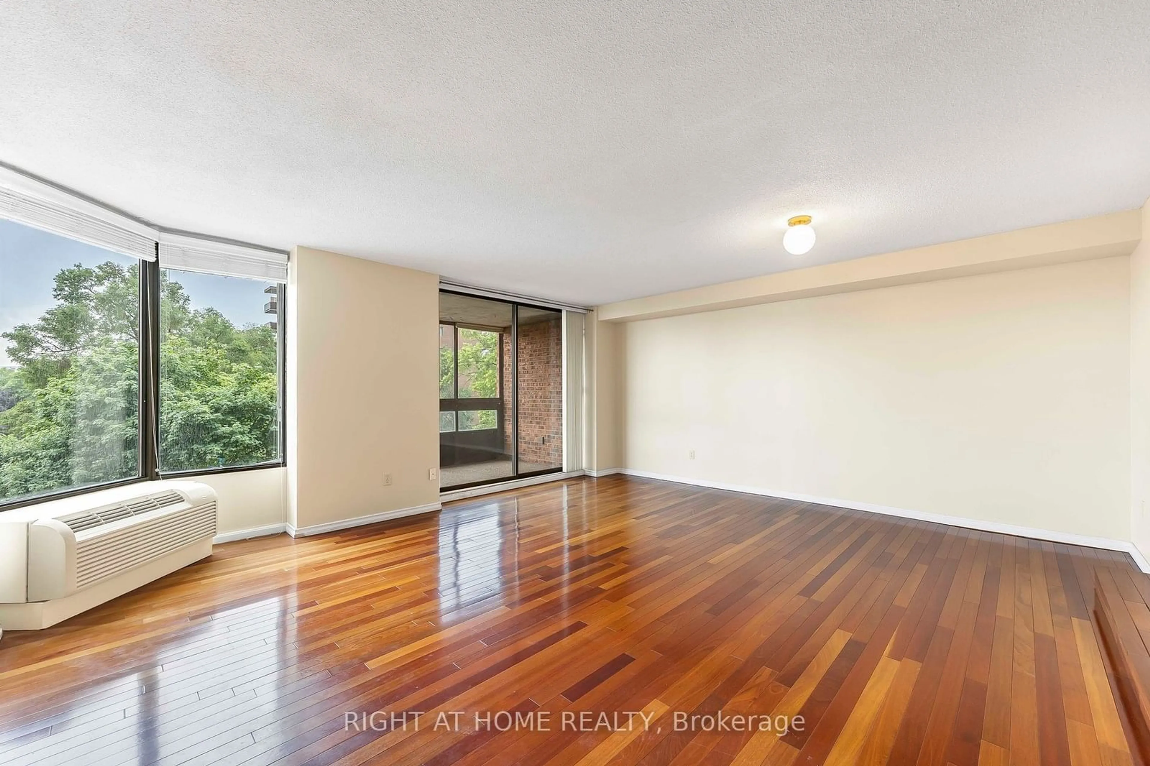 A pic of a room, wood floors for 181 Collier St #304, Barrie Ontario L4M 5L6