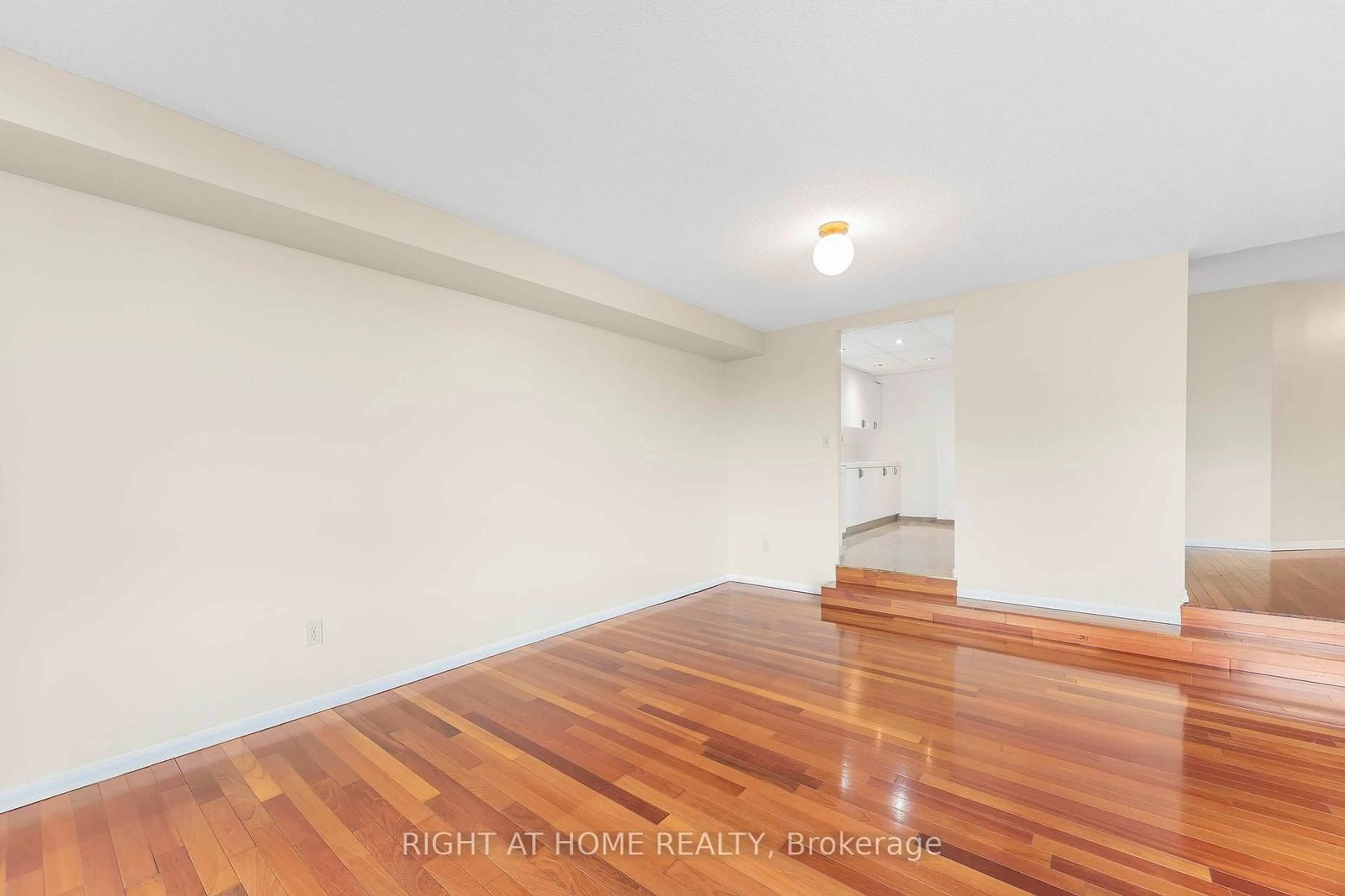 A pic of a room, wood floors for 181 Collier St #304, Barrie Ontario L4M 5L6