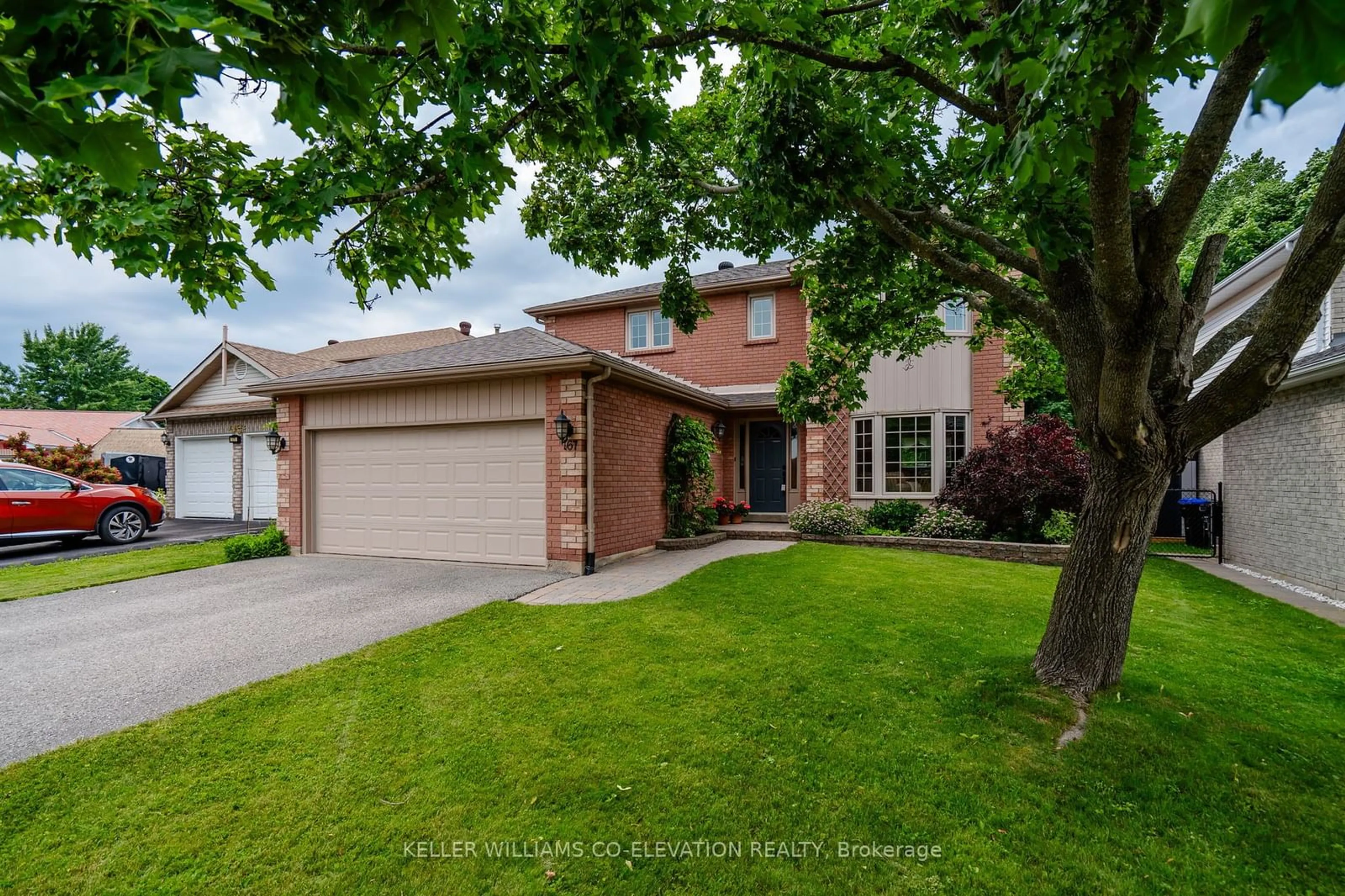 Frontside or backside of a home, the street view for 167 Luckport Cres, Midland Ontario L4R 4Y1