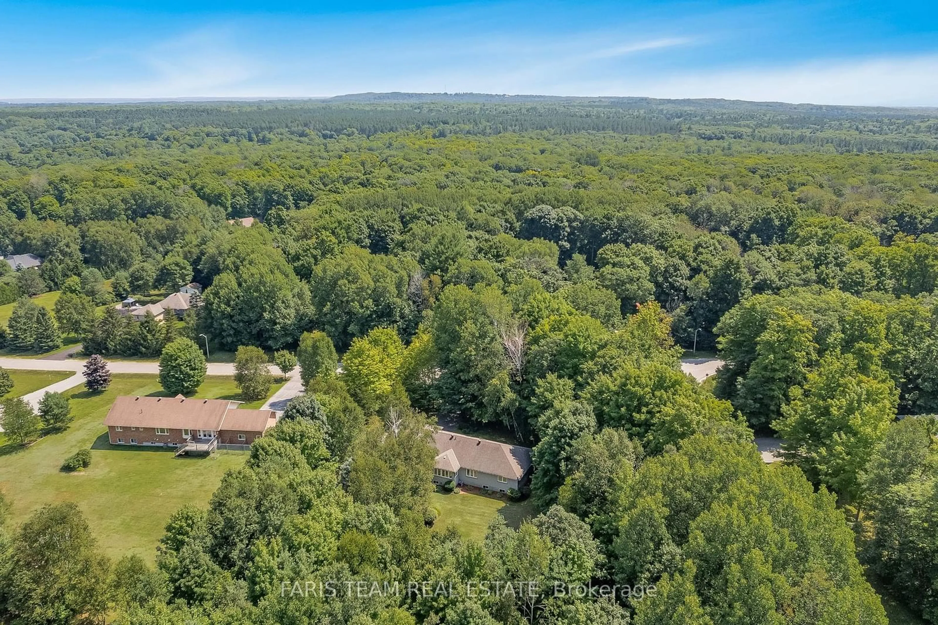 A pic from outside/outdoor area/front of a property/back of a property/a pic from drone, forest/trees view for 70 Copeland Creek Dr, Tiny Ontario L9M 0M2