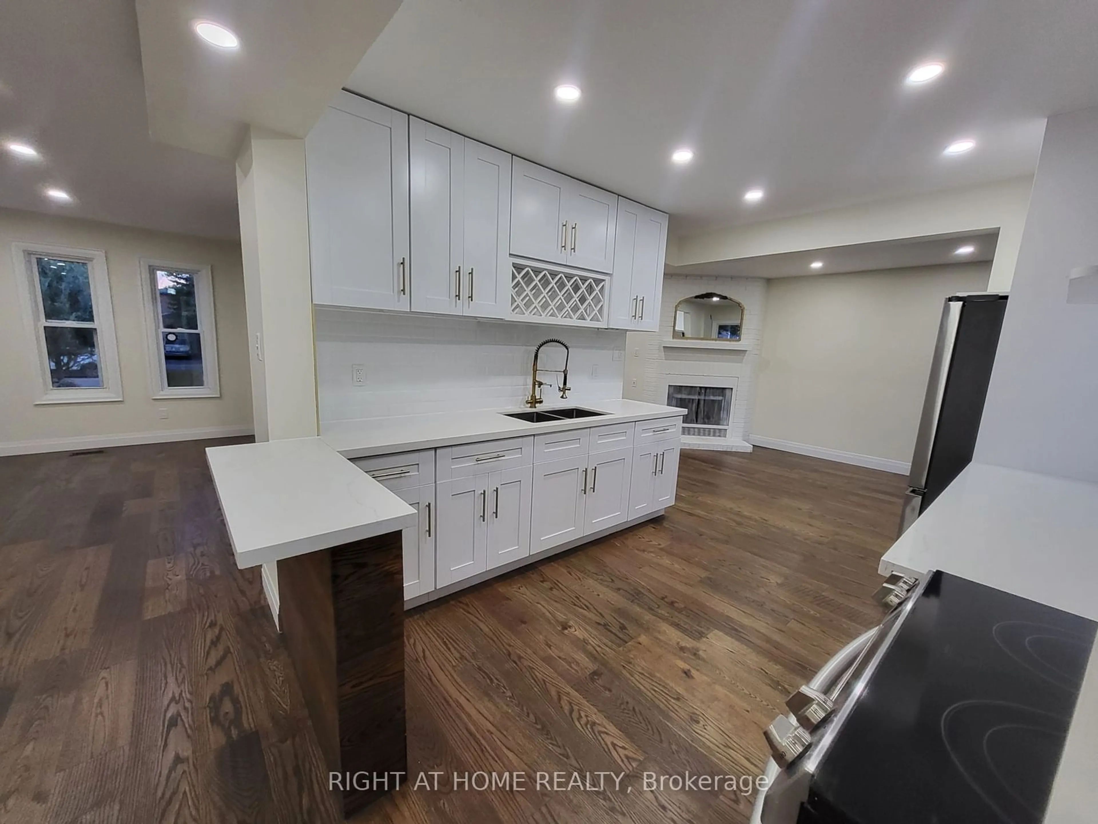 Open concept kitchen for 247 Hickling Tr, Barrie Ontario L4M 5W9