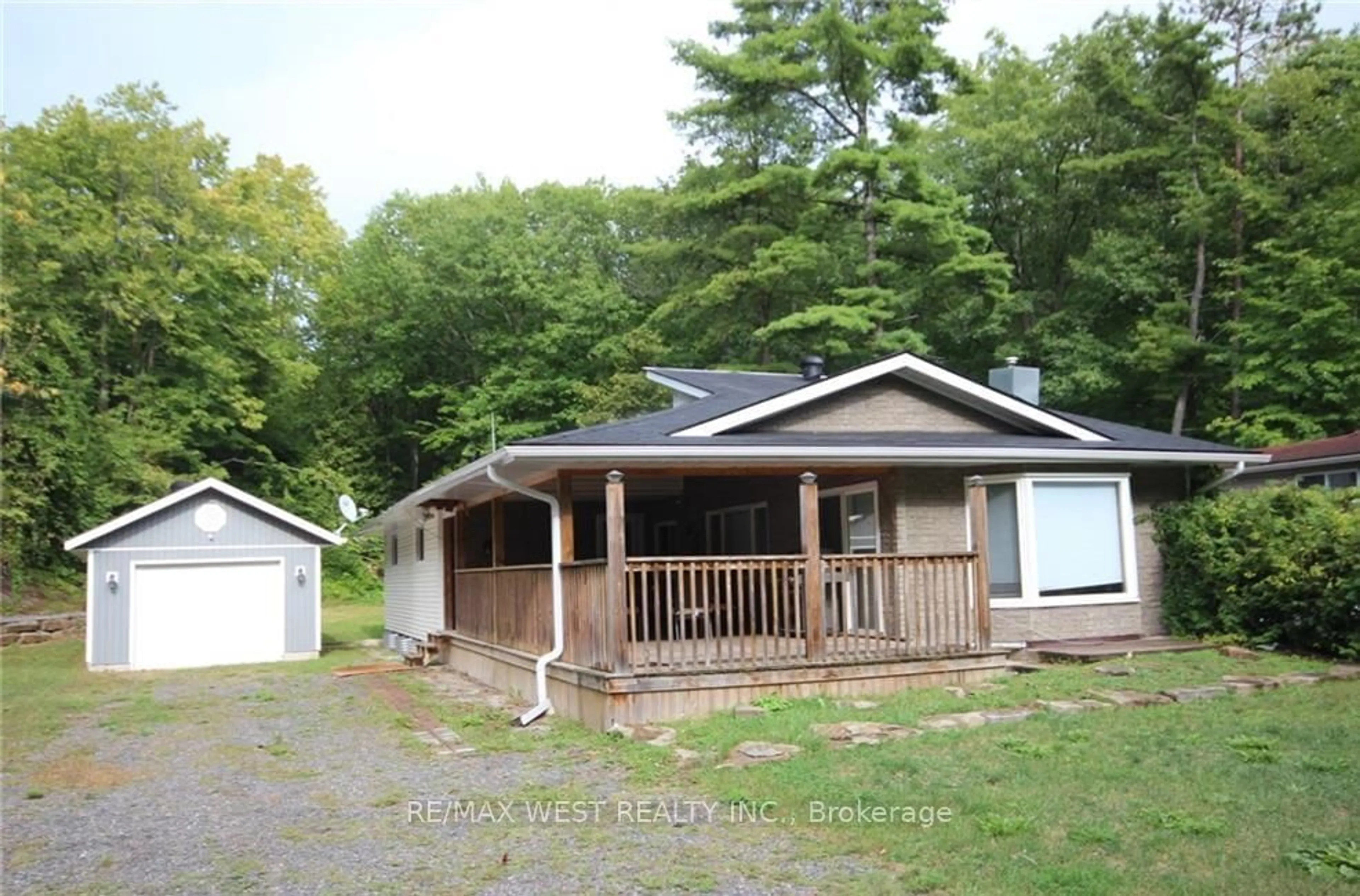 Frontside or backside of a home, cottage for 1203 Tiny Beaches Rd, Tiny Ontario L0L 2T0