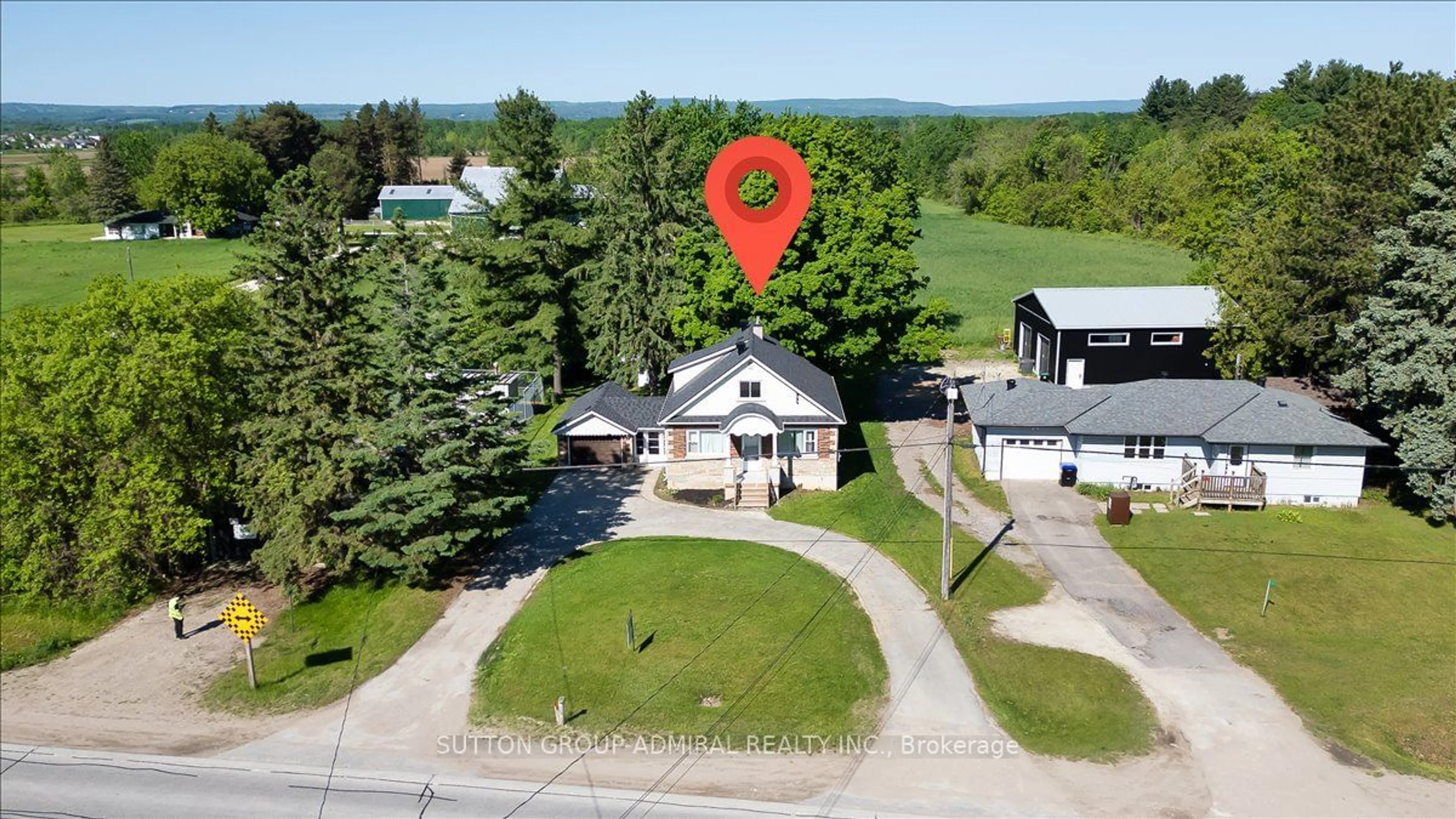 A pic from exterior of the house or condo, the street view for 7613 Highway 26, Clearview Ontario L0M 1S0