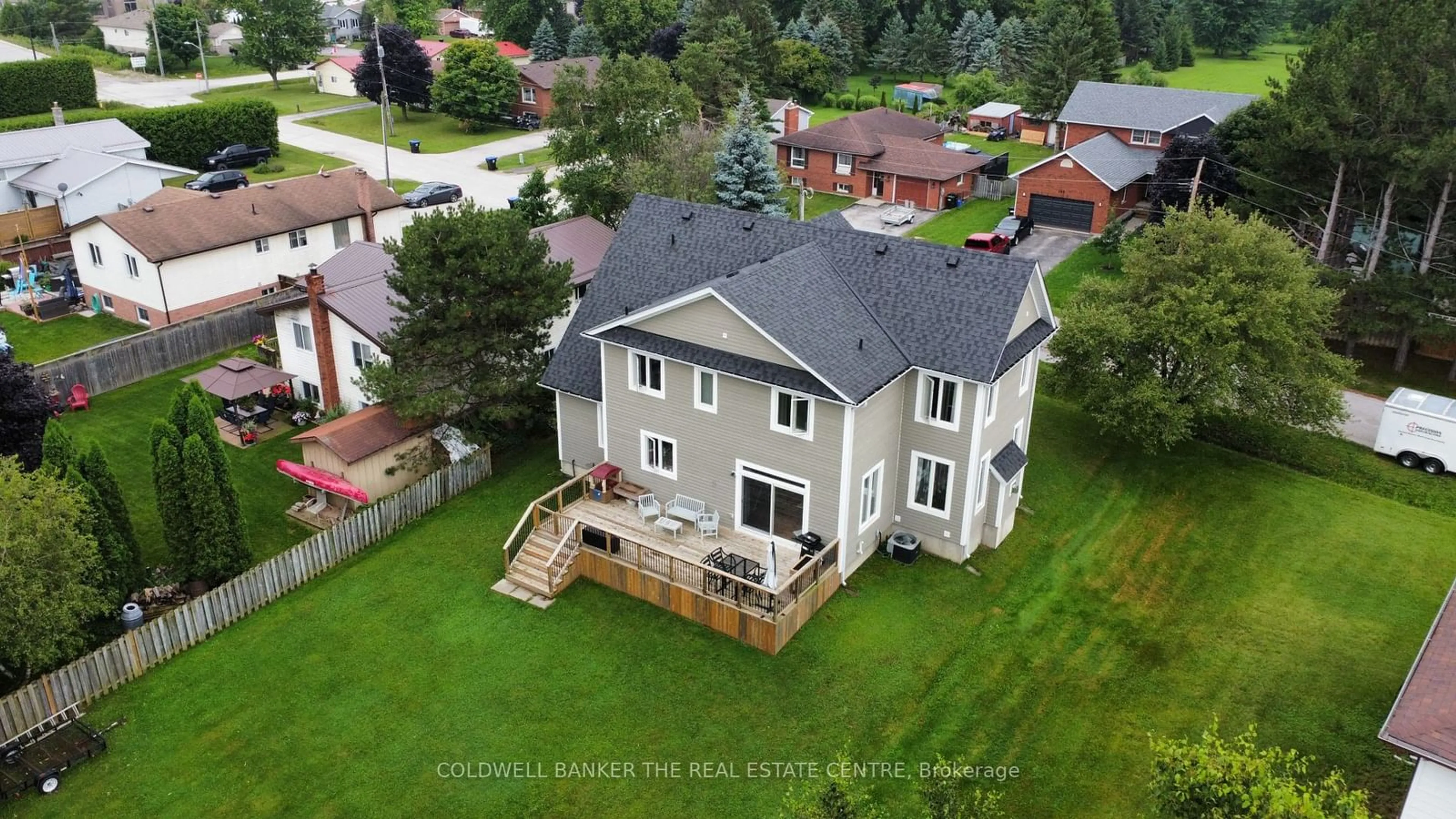 Frontside or backside of a home, the fenced backyard for 202 Clarence St, Clearview Ontario L4N 1B9