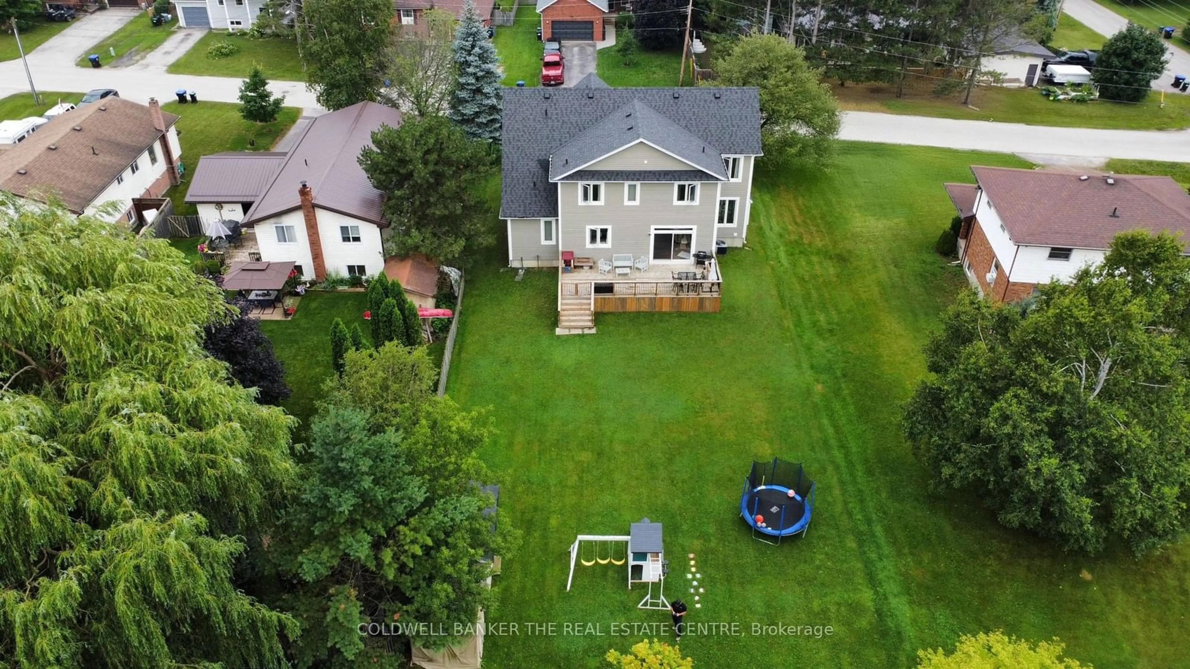 Frontside or backside of a home, the fenced backyard for 202 Clarence St, Clearview Ontario L4N 1B9