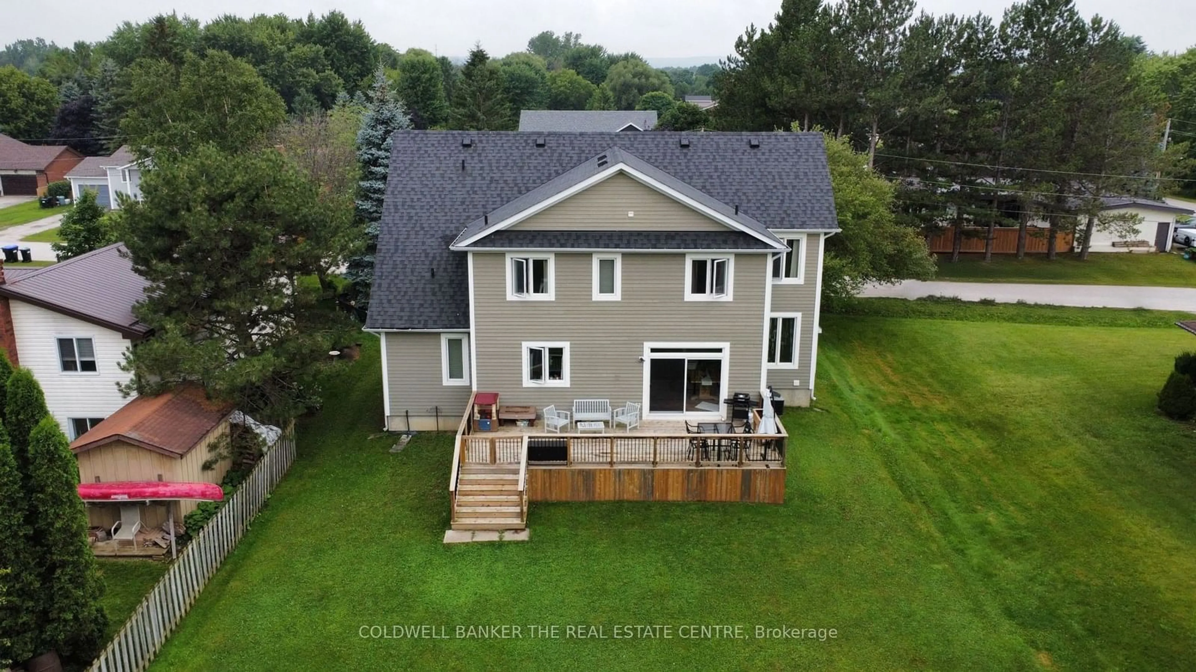 Frontside or backside of a home, the fenced backyard for 202 Clarence St, Clearview Ontario L4N 1B9