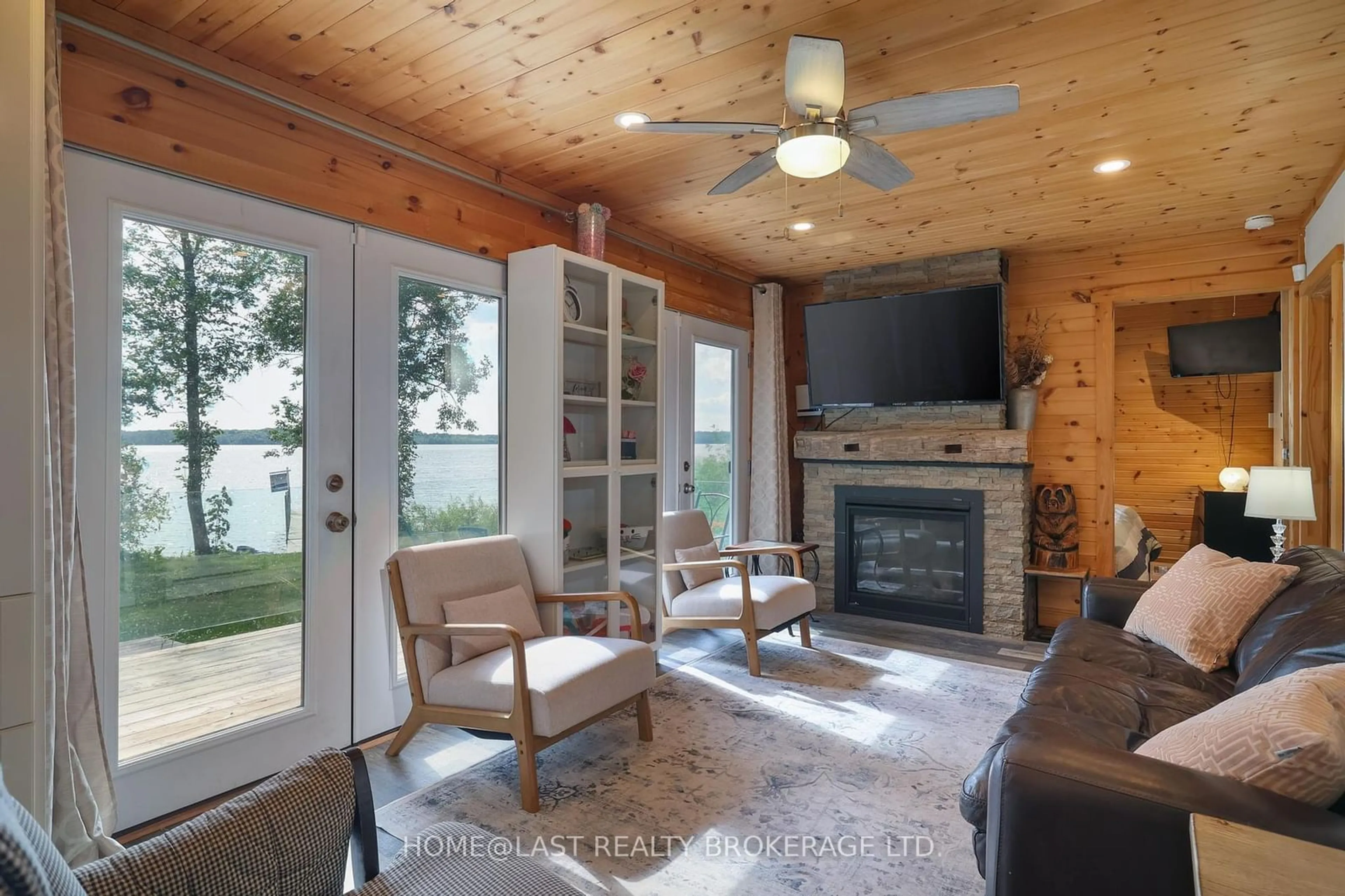 Living room, wood floors for 6306 Bluebird St, Ramara Ontario L3V 6H6