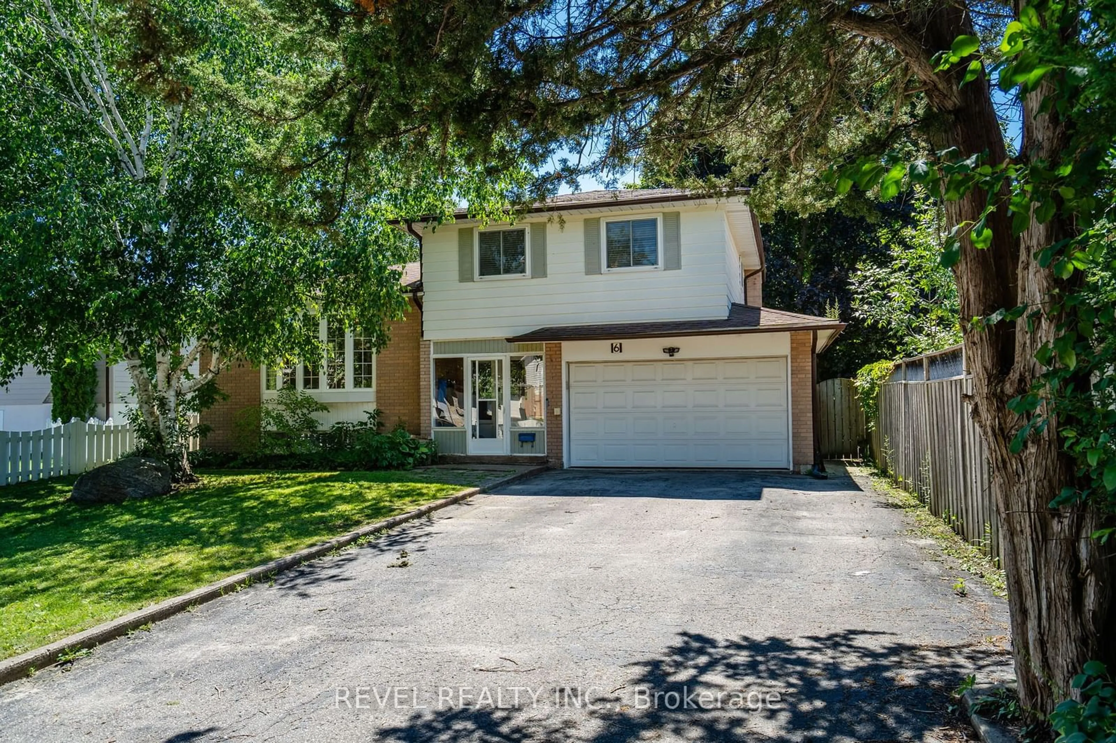 Frontside or backside of a home, the street view for 6 Huron St, Barrie Ontario L4M 5H3