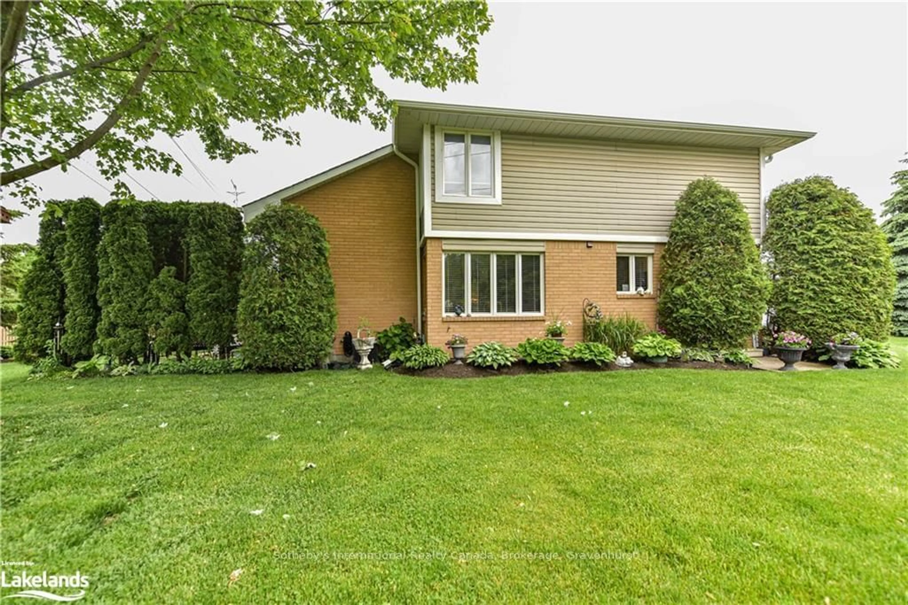 Frontside or backside of a home, the fenced backyard for 10 MUSEUM Dr #101, Orillia Ontario L3V 7T9