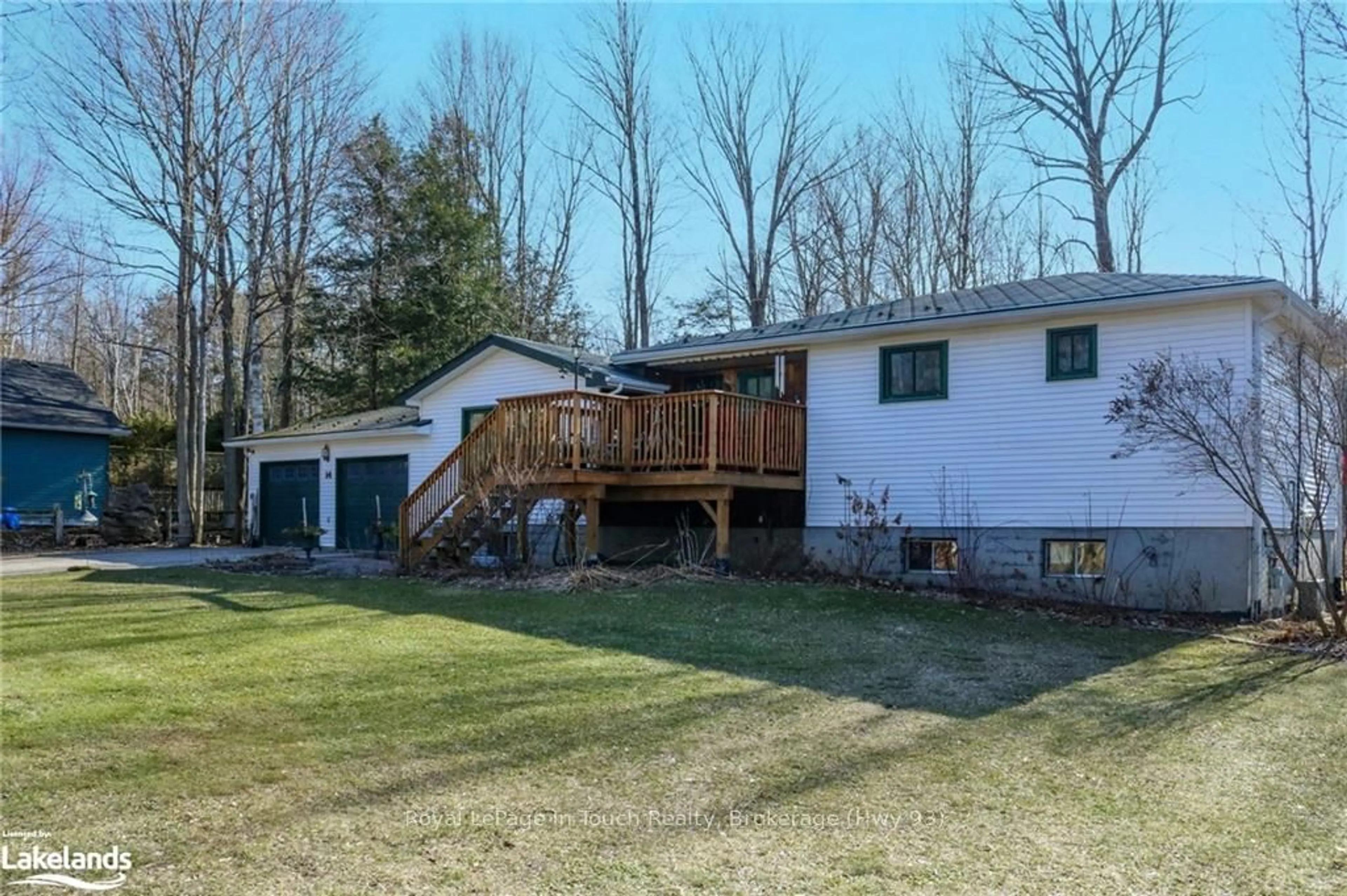 Frontside or backside of a home, cottage for 14 SENECA Cres, Tiny Ontario L9M 0C9