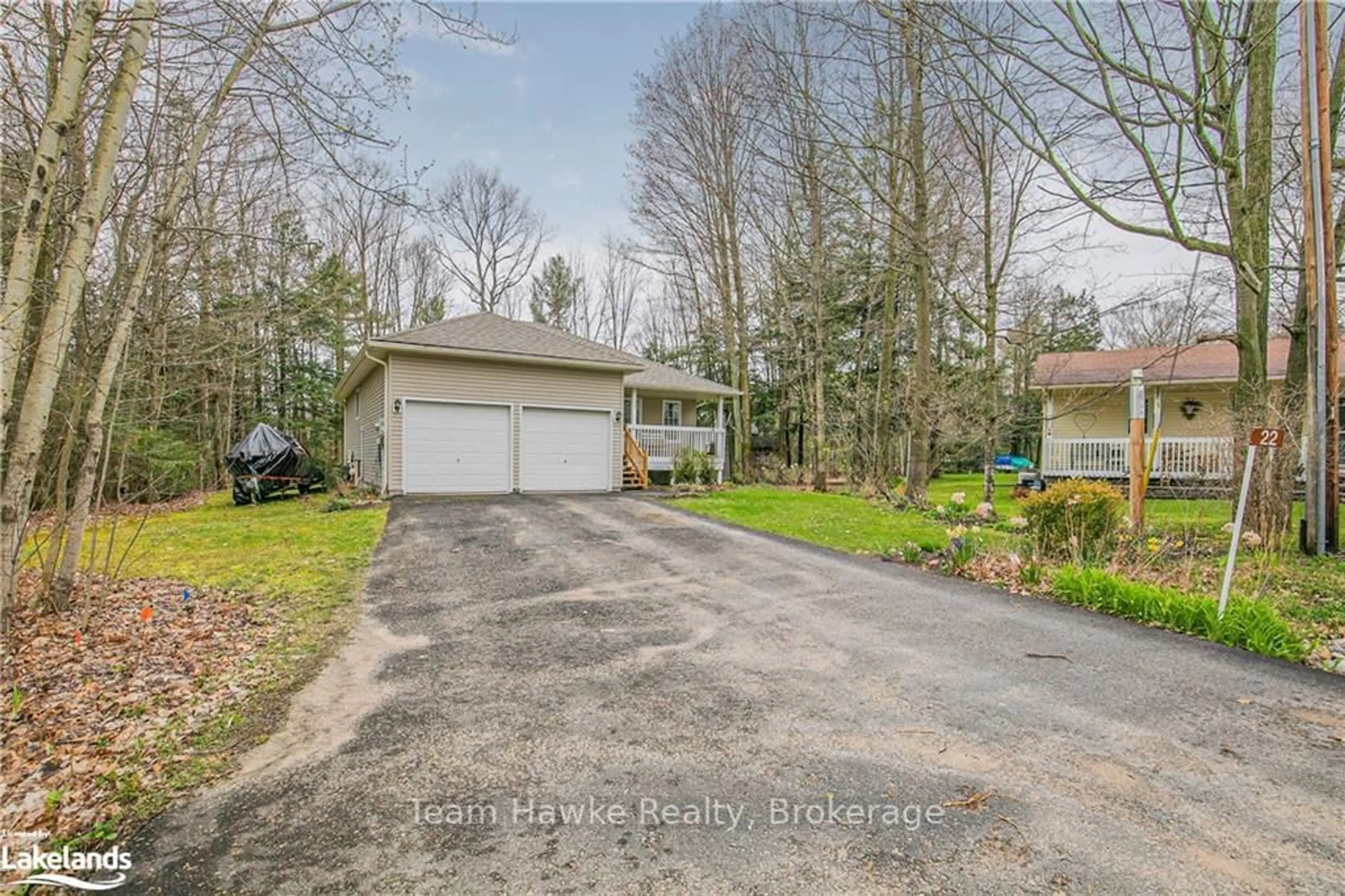 Frontside or backside of a home, cottage for 22 LAURIER Blvd, Tiny Ontario L9M 0J2