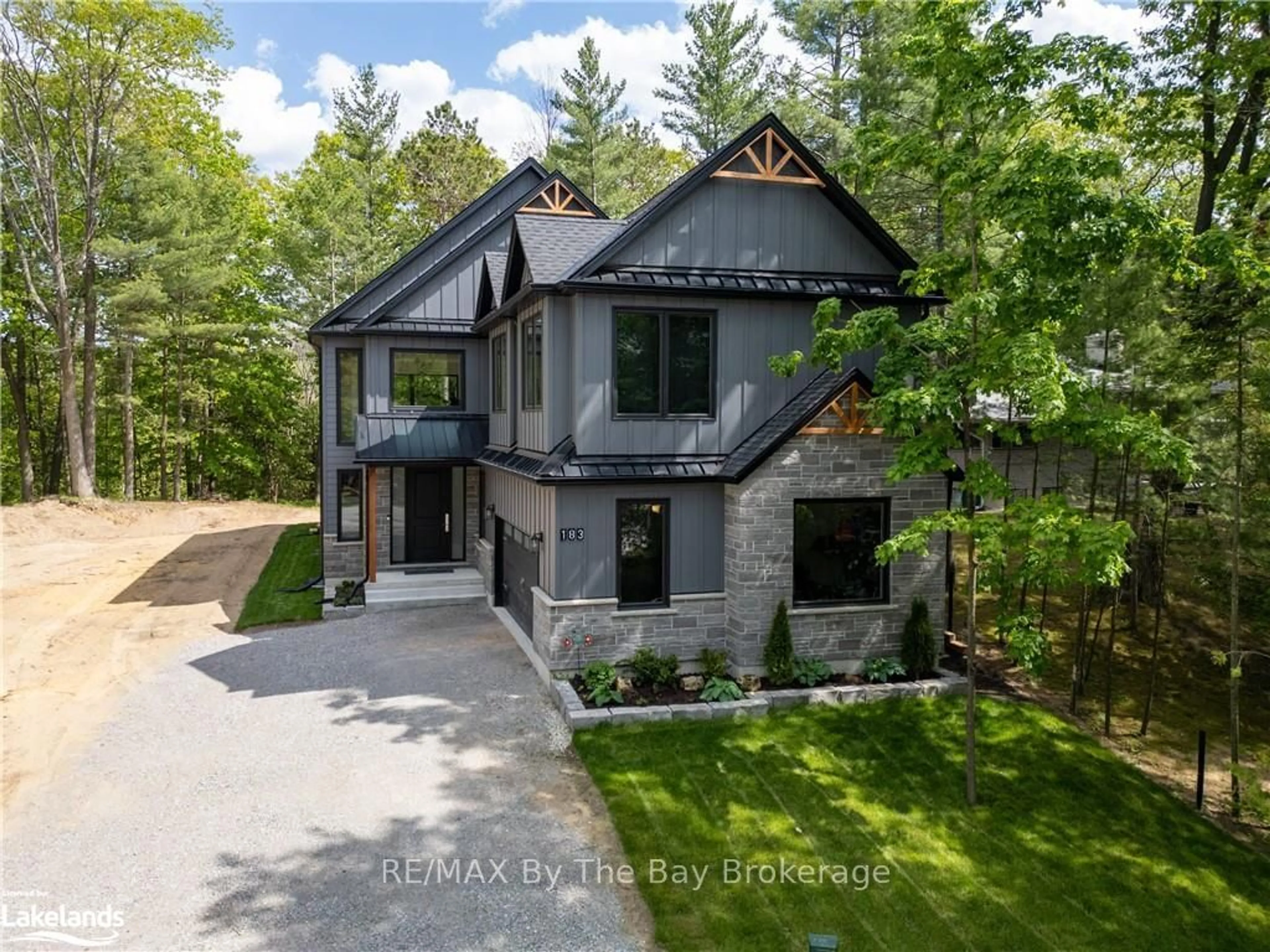 Frontside or backside of a home, cottage for 183 WOODLAND DRIVE, Wasaga Beach Ontario L9Z 2V4