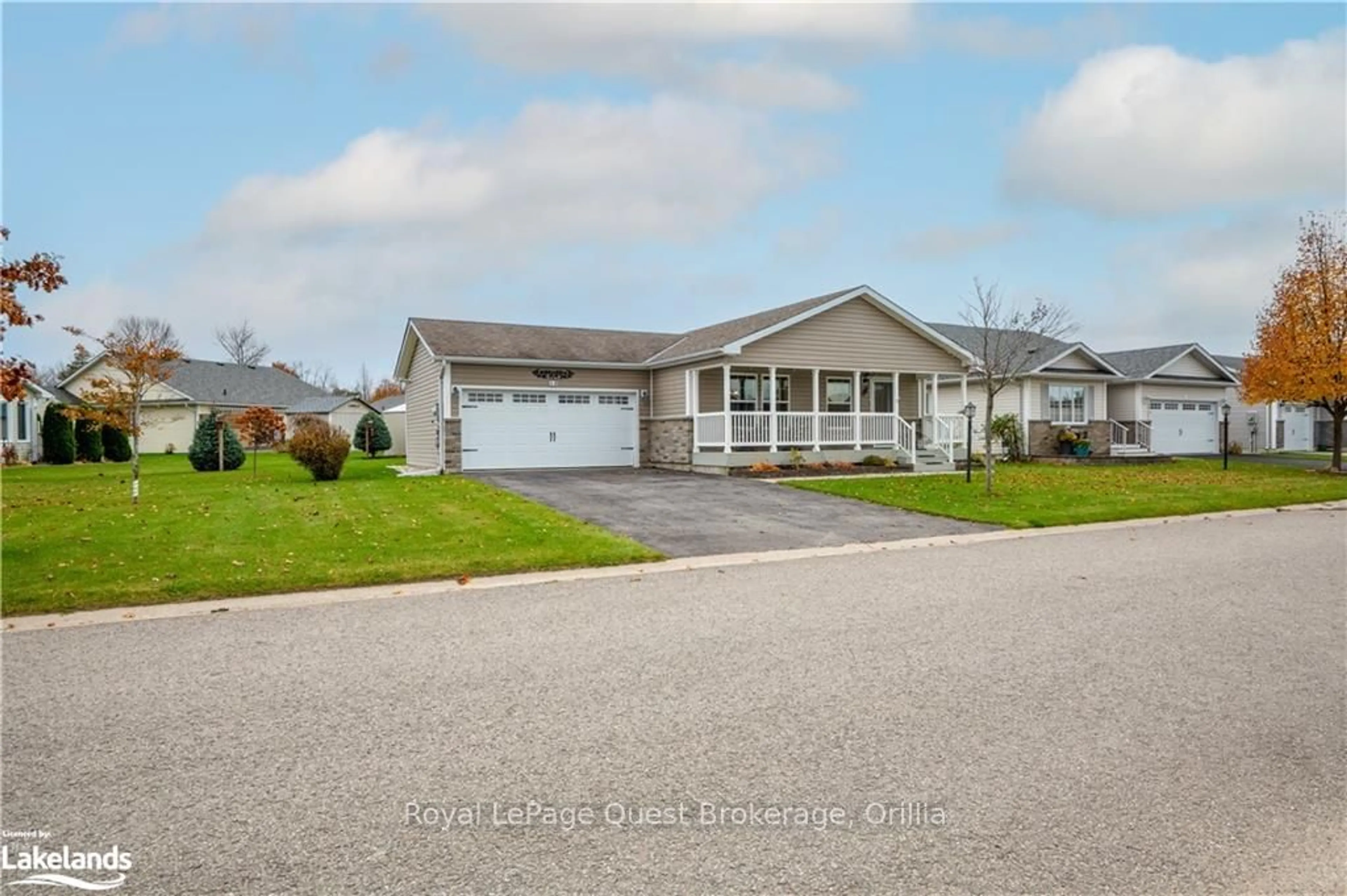 Frontside or backside of a home, the street view for 13 MARVIN GARDENS Blvd, Wasaga Beach Ontario L9Z 3A8