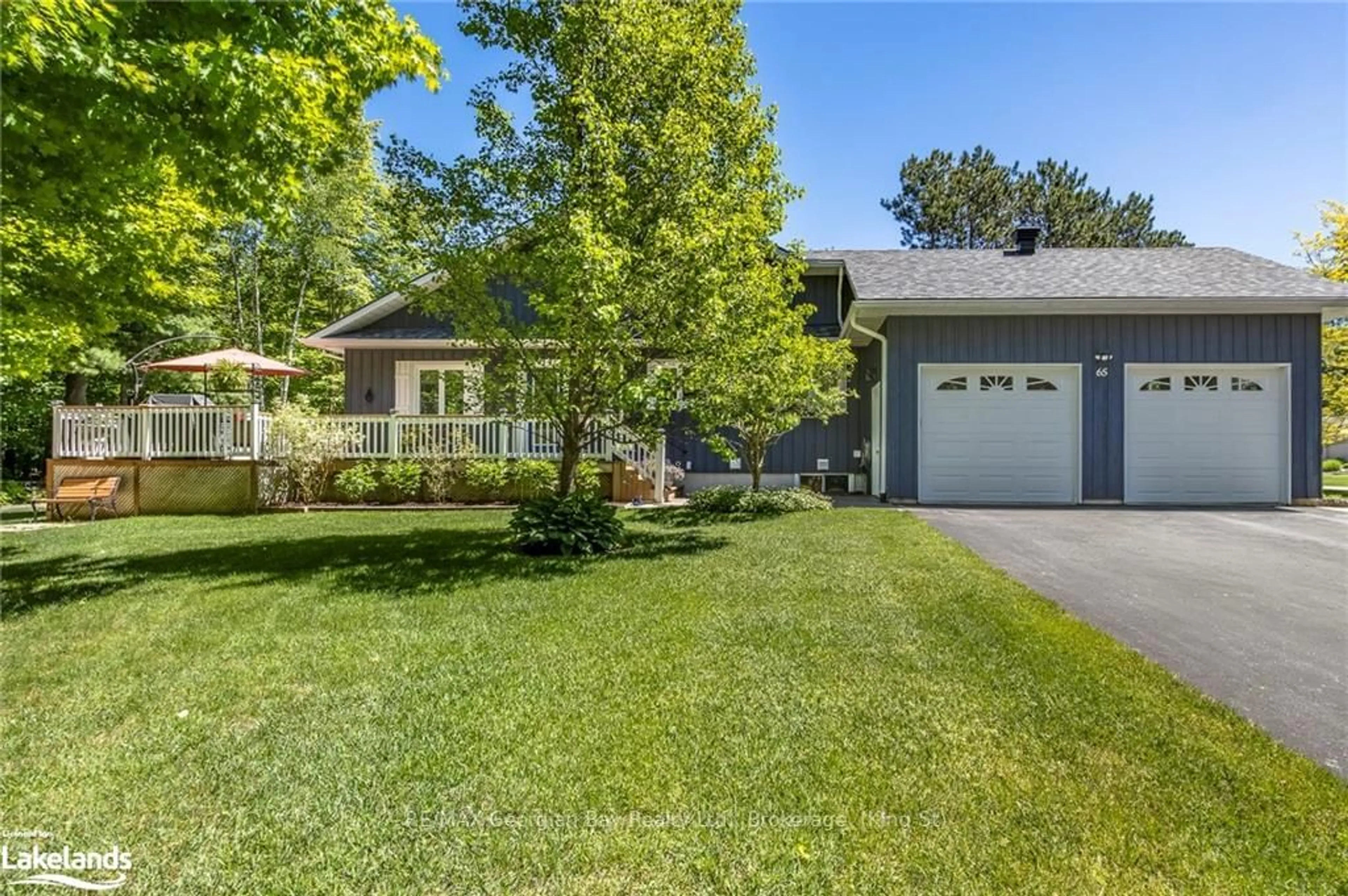 Frontside or backside of a home, cottage for 65 MOURNING DOVE Tr, Tiny Ontario L0L 2J0