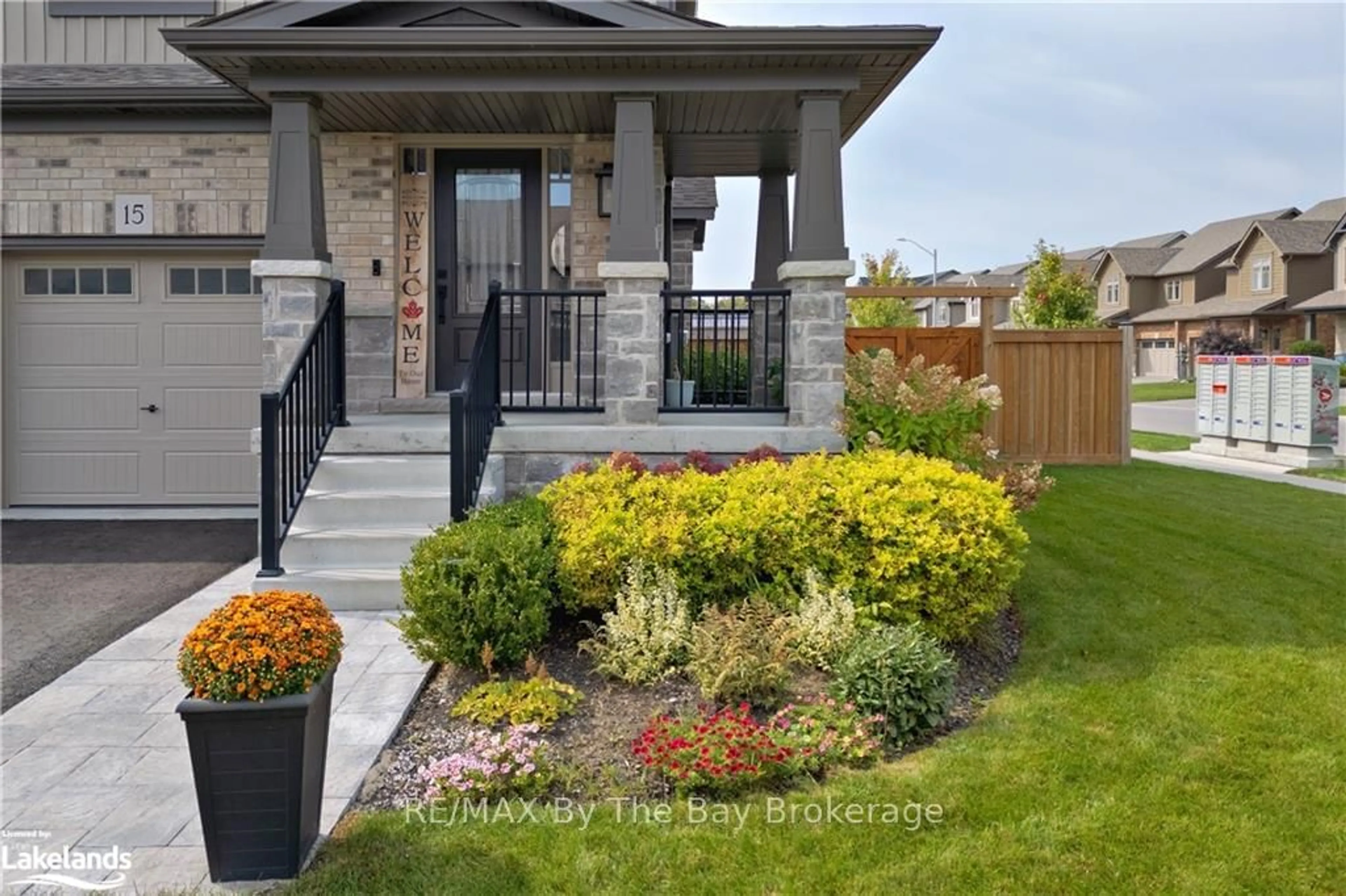 Frontside or backside of a home, the fenced backyard for 15 FOLEY Cres, Collingwood Ontario L9Y 3B7