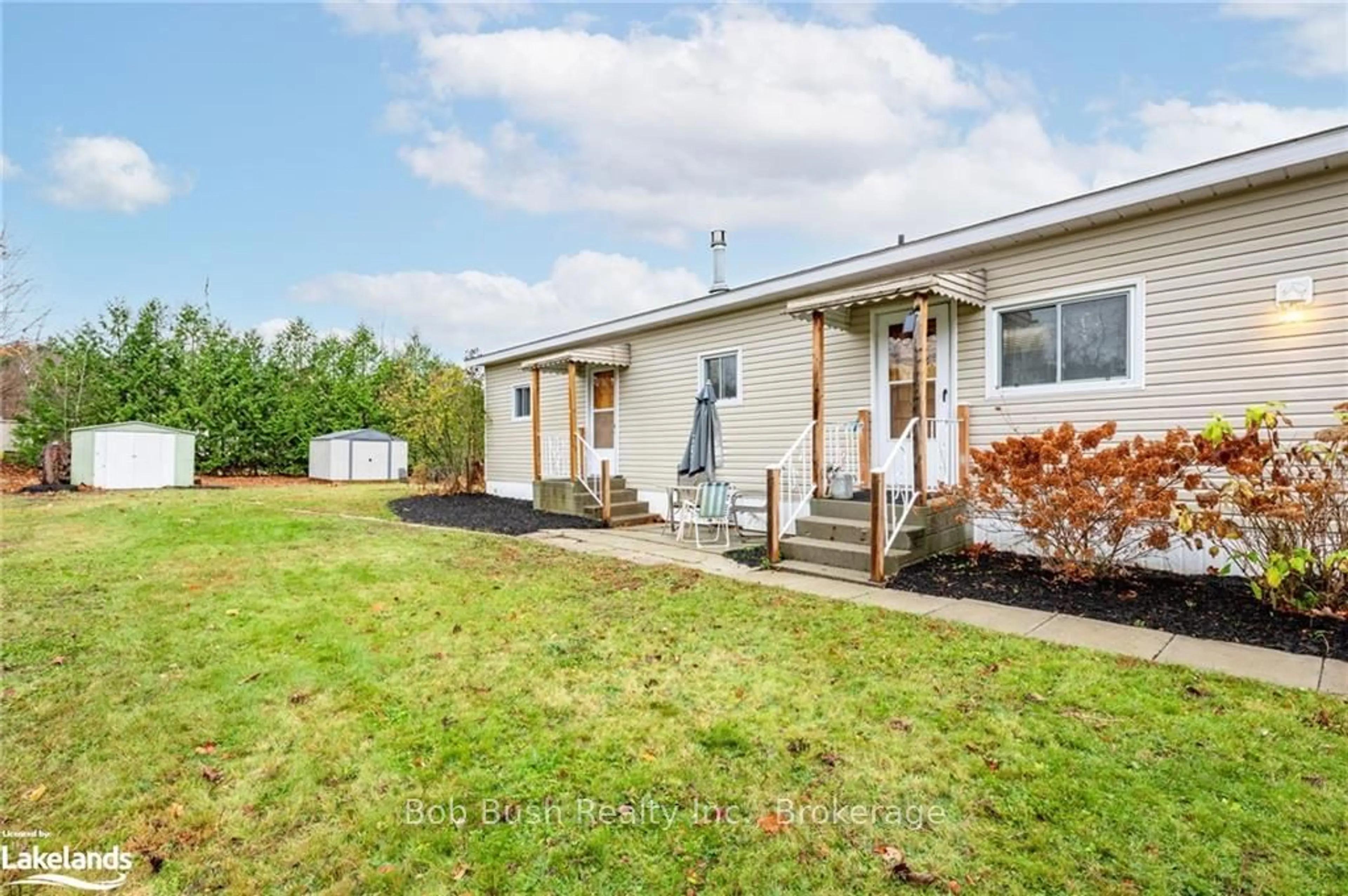 Frontside or backside of a home, the fenced backyard for 5263 ELLIOTT SIDEROAD #6, Tay Ontario L4R 4K3