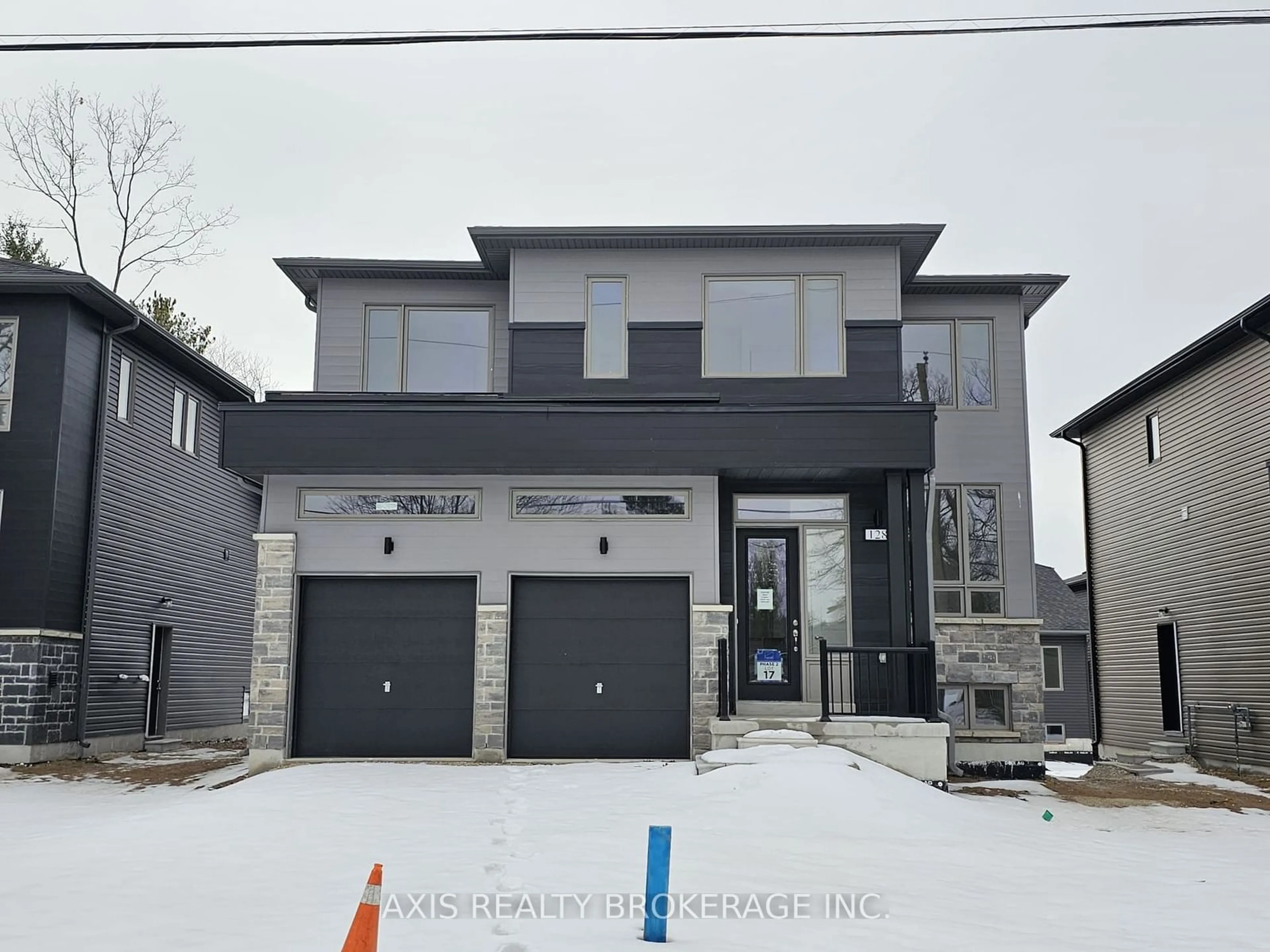 Frontside or backside of a home, the street view for 128 Ansley Rd, Wasaga Beach Ontario L9Z 2N5