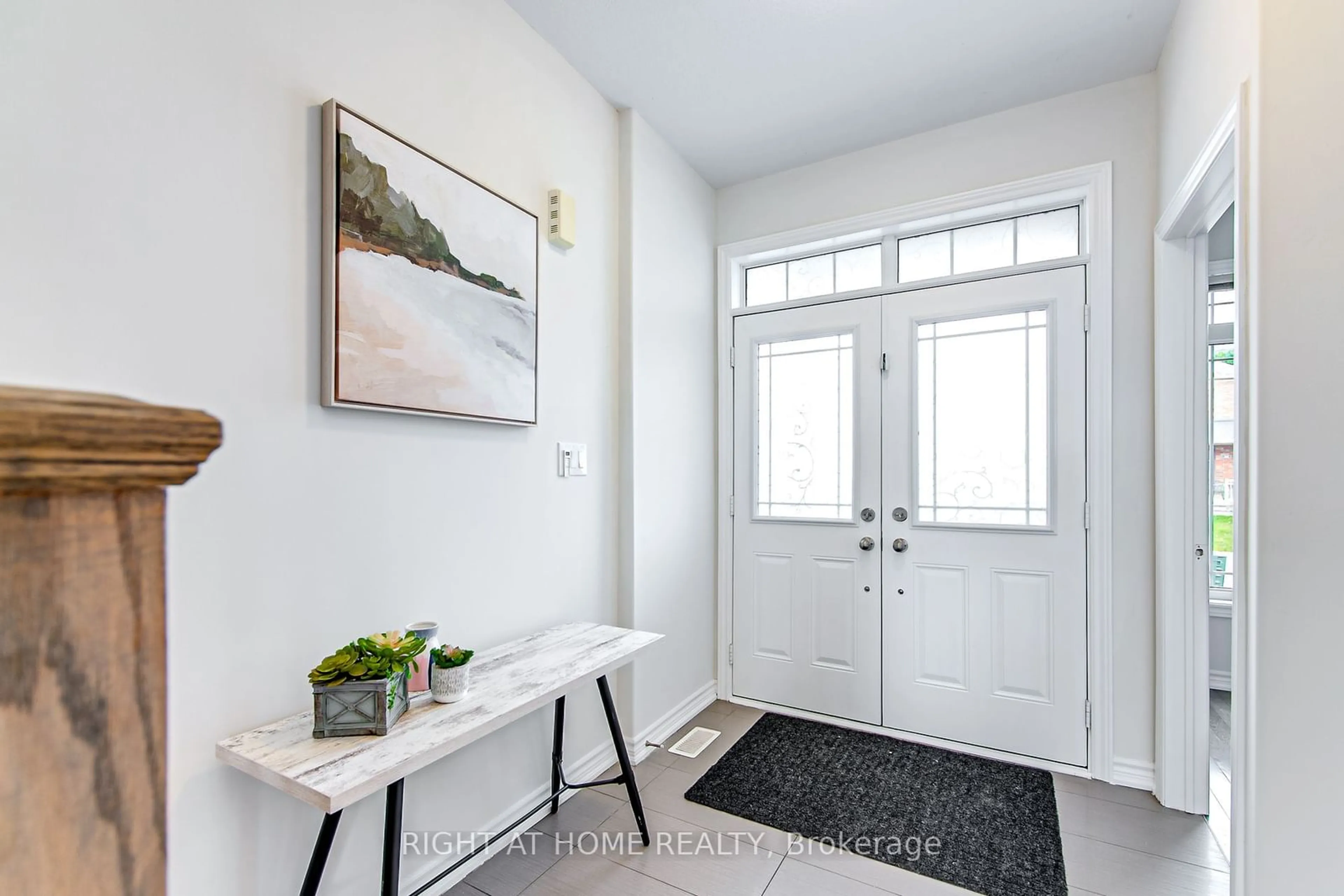 Indoor entryway, wood floors for 56 Megan Cres, Barrie Ontario L4N 6E4