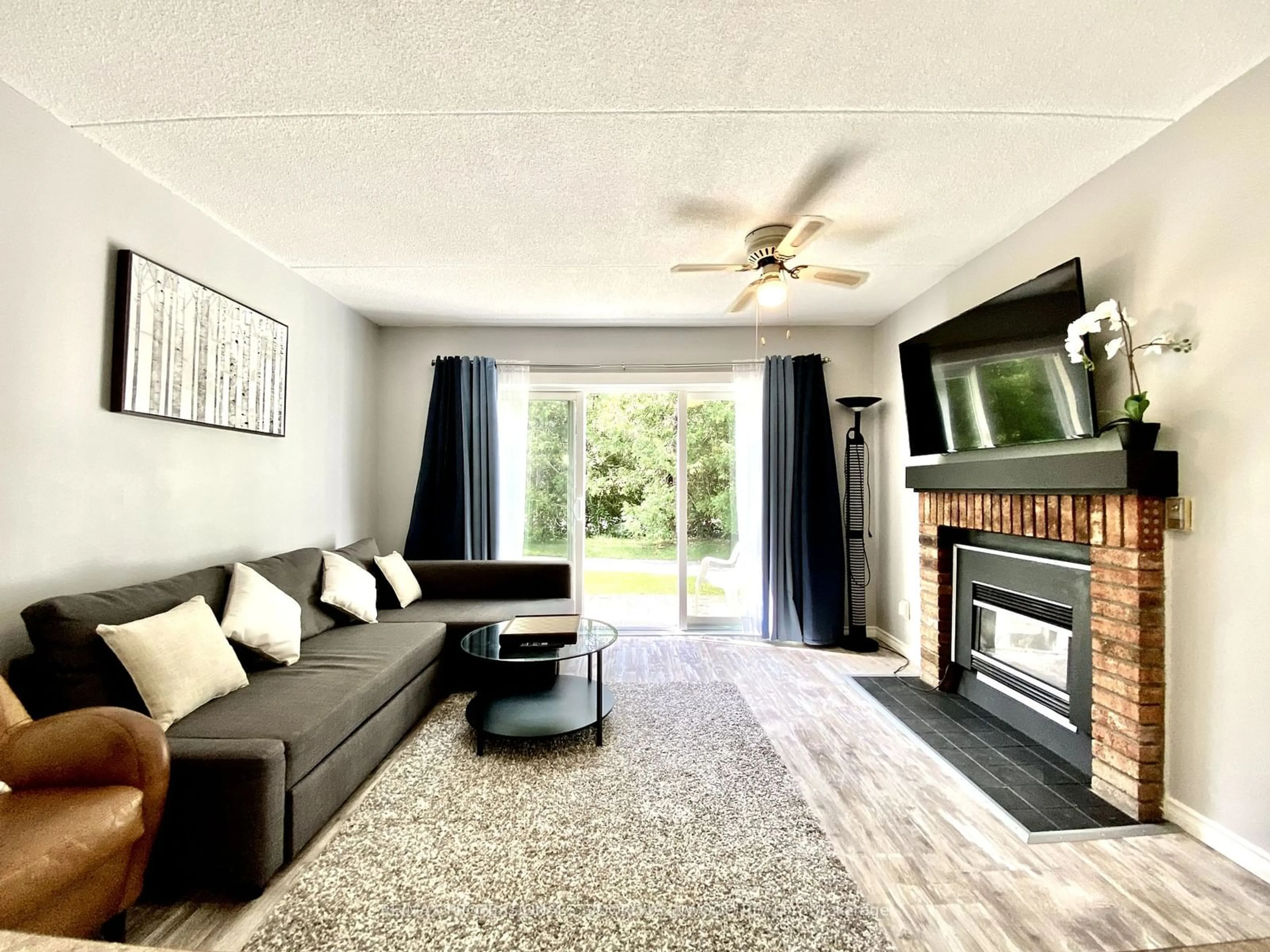 Living room, wood floors for 21 Dawson Dr #74, Collingwood Ontario L9Y 5B4