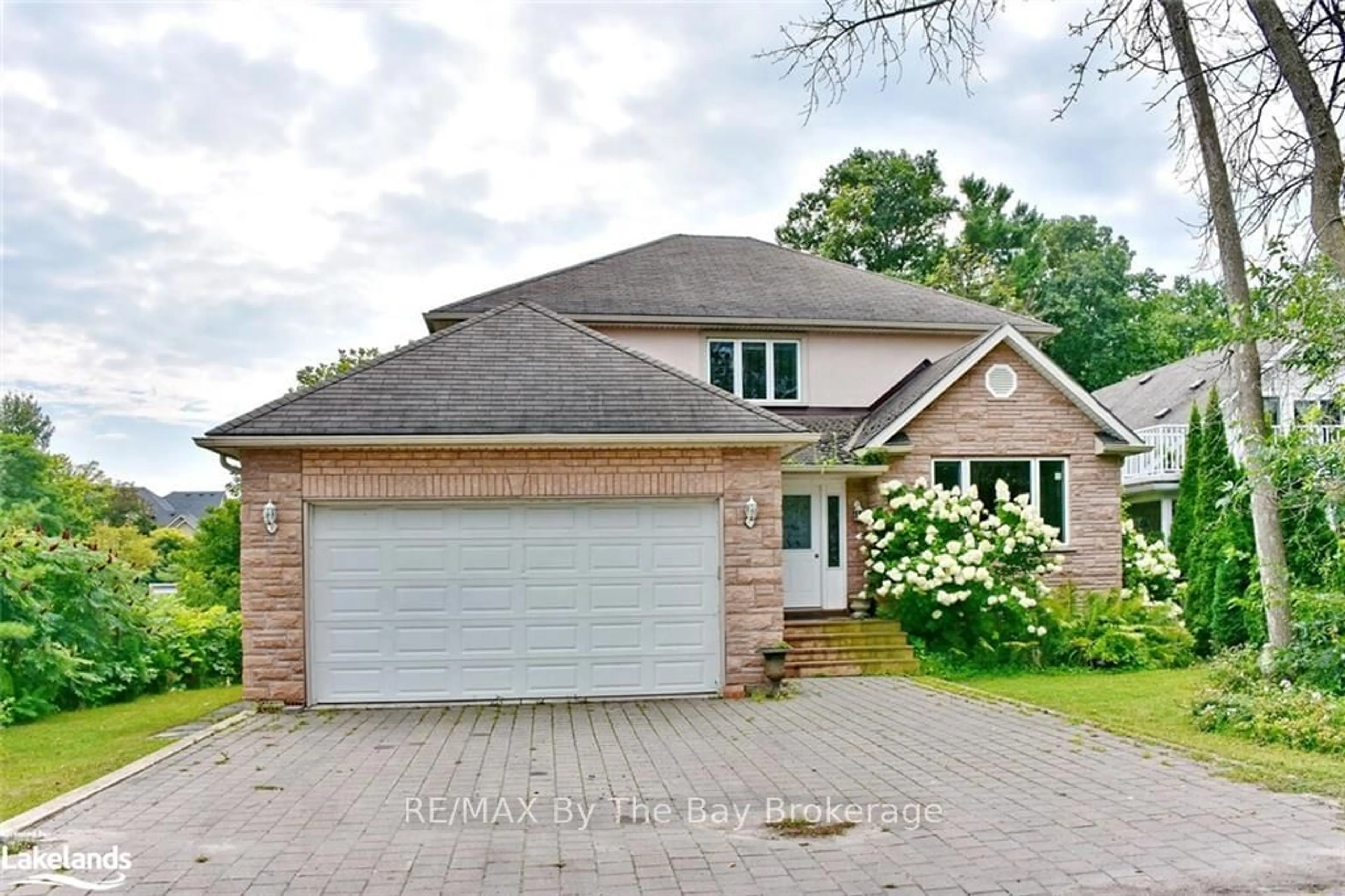 Home with brick exterior material for 243 RIVER ROAD EAST, Wasaga Beach Ontario L9Z 2L1