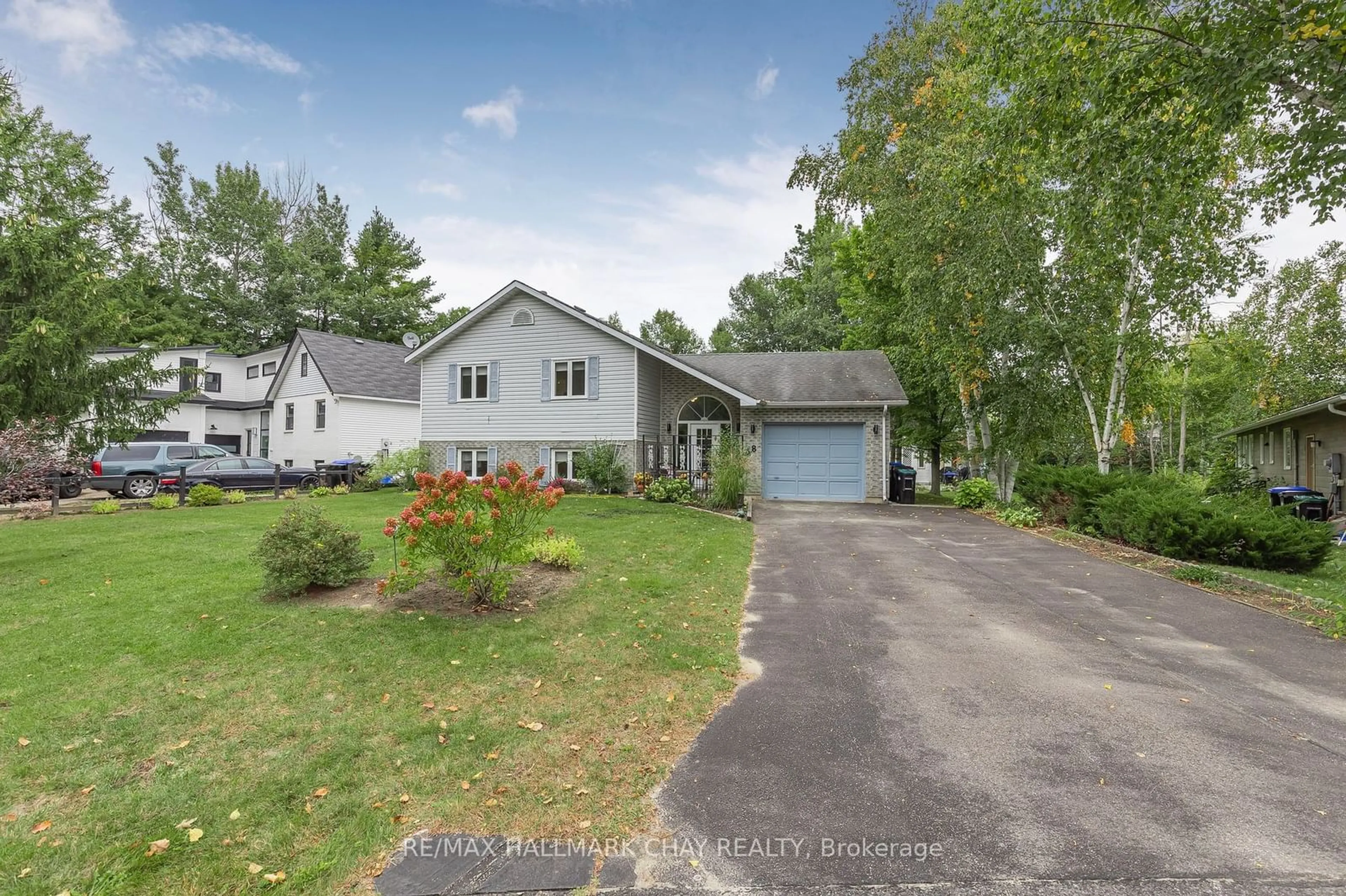 Frontside or backside of a home, the street view for 38 Fatima Crt, Wasaga Beach Ontario L9Z 1K9