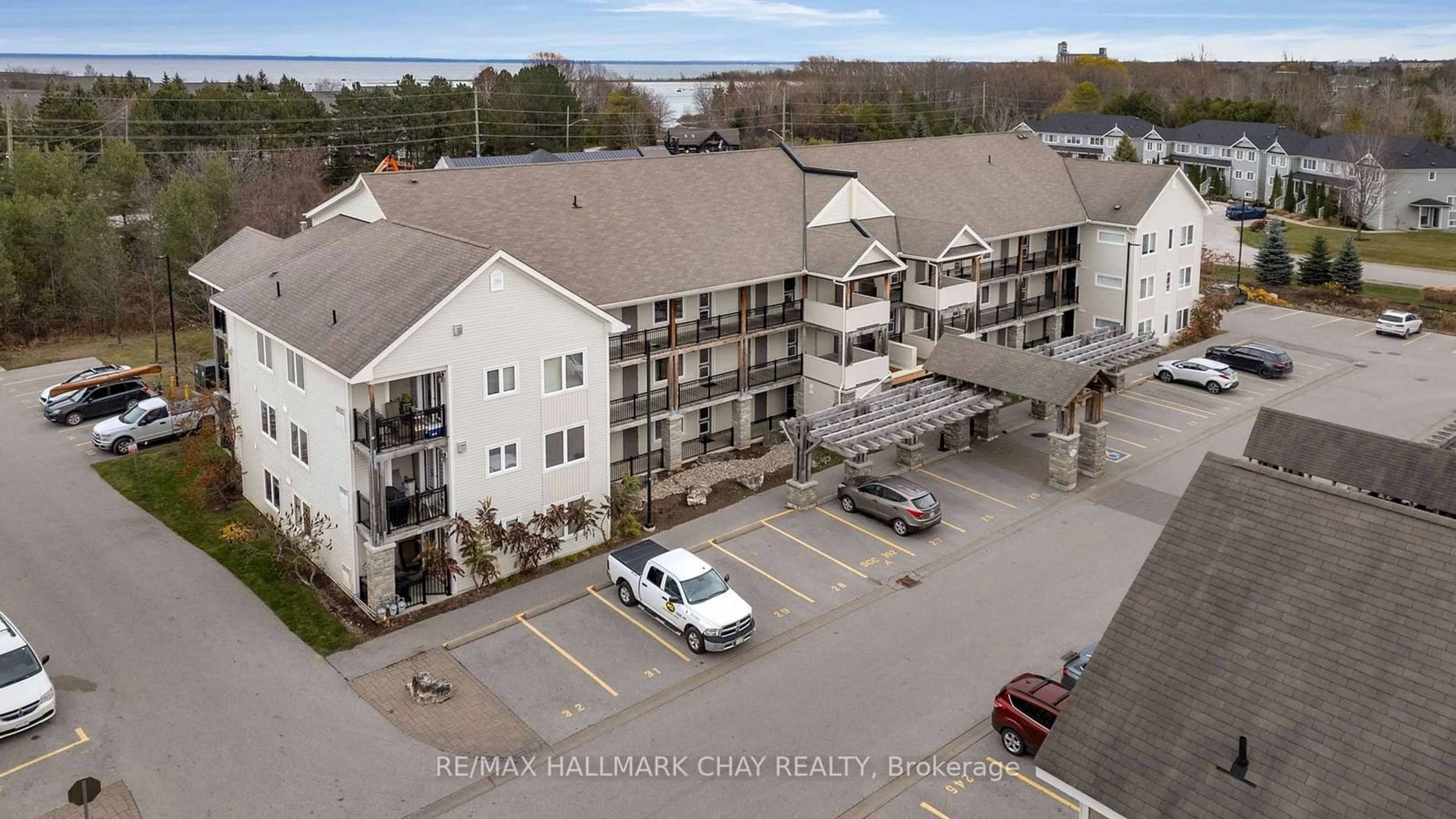 A pic from exterior of the house or condo, the front or back of building for 1 Brandy Lane Dr #105, Collingwood Ontario L9Y 0X4