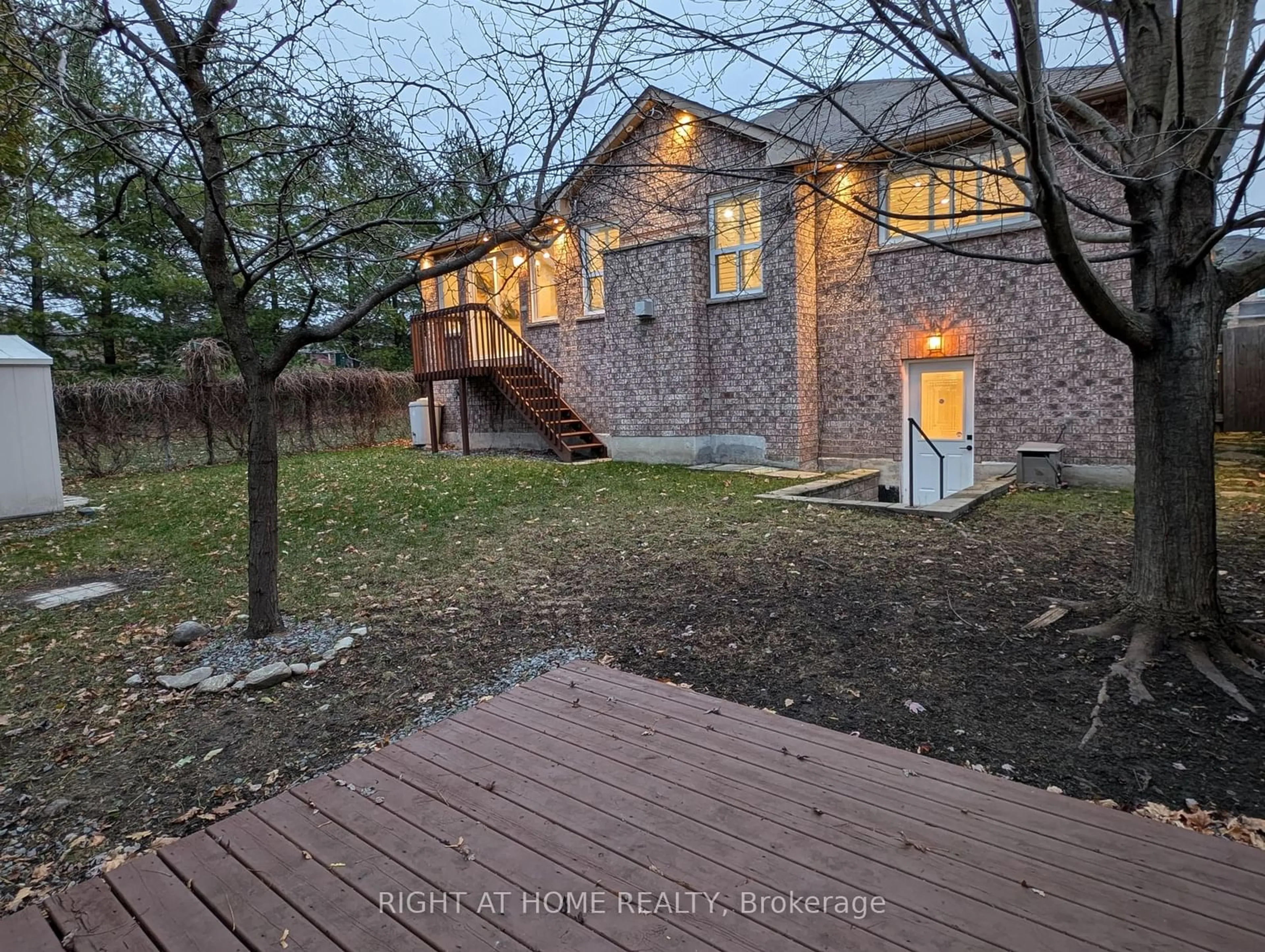 Frontside or backside of a home, the fenced backyard for 16 Imperial Crown Lane, Barrie Ontario L4N 0T4