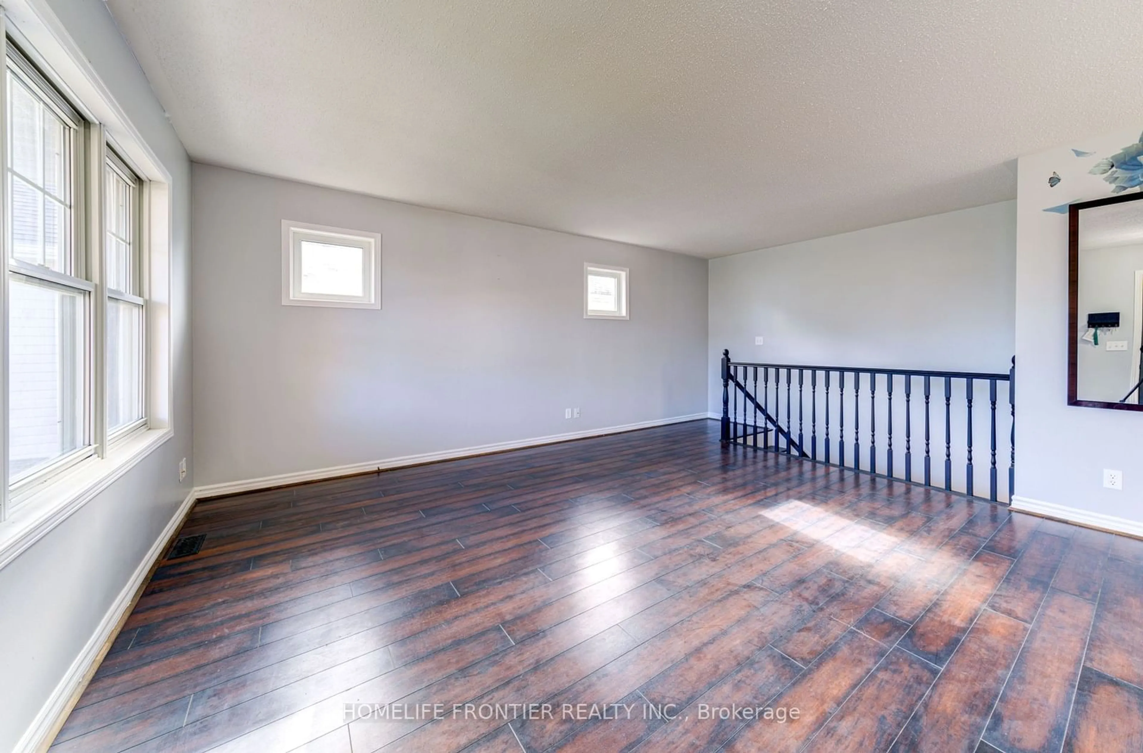 A pic of a room, wood floors for 10 River Run, Collingwood Ontario L9Y 5J7