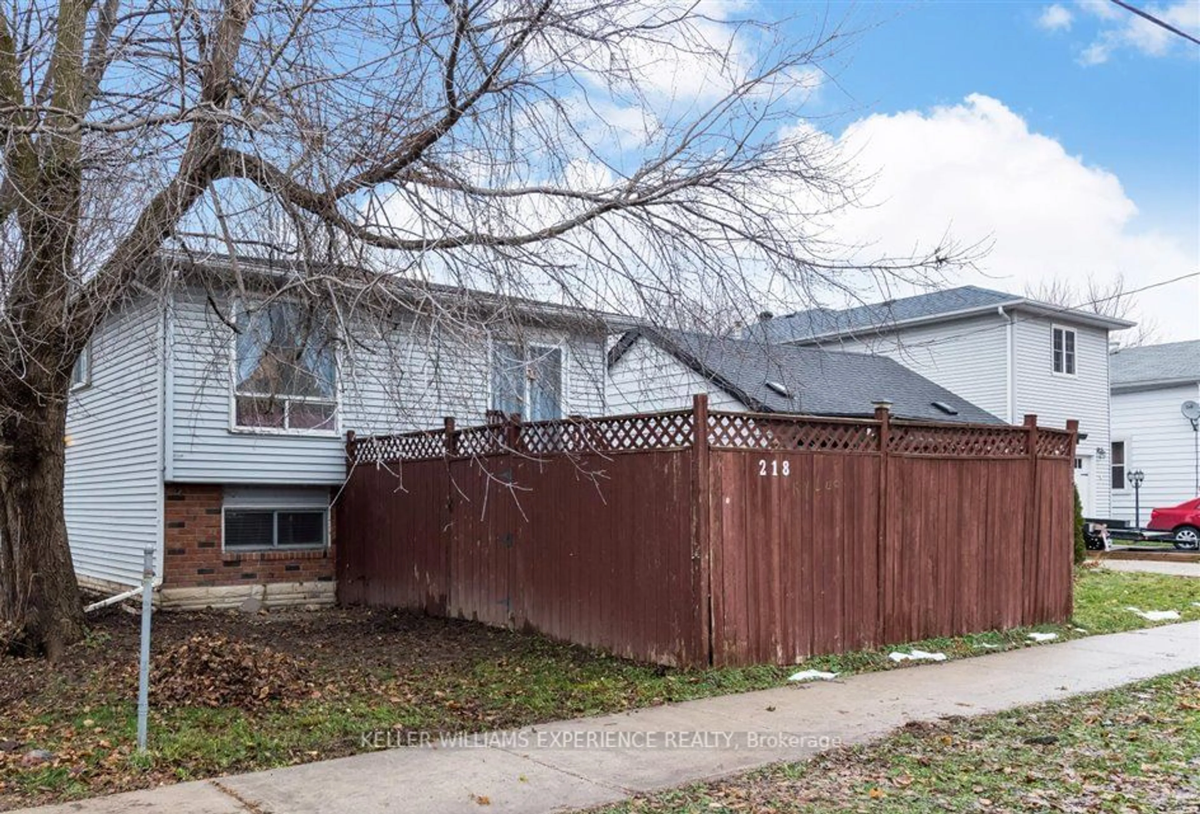 Frontside or backside of a home, the fenced backyard for 218 Hilda St, Orillia Ontario L3V 1J1