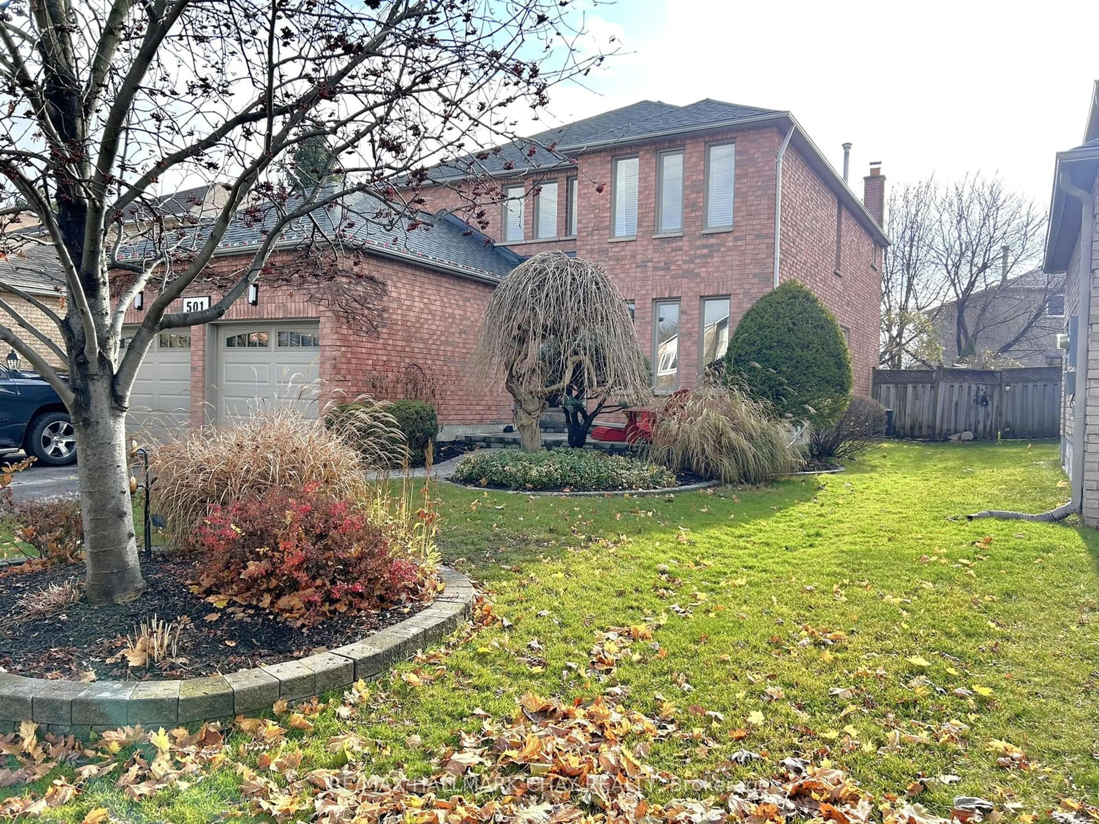 Frontside or backside of a home, the fenced backyard for 501 Grove St, Barrie Ontario L4M 5Z4