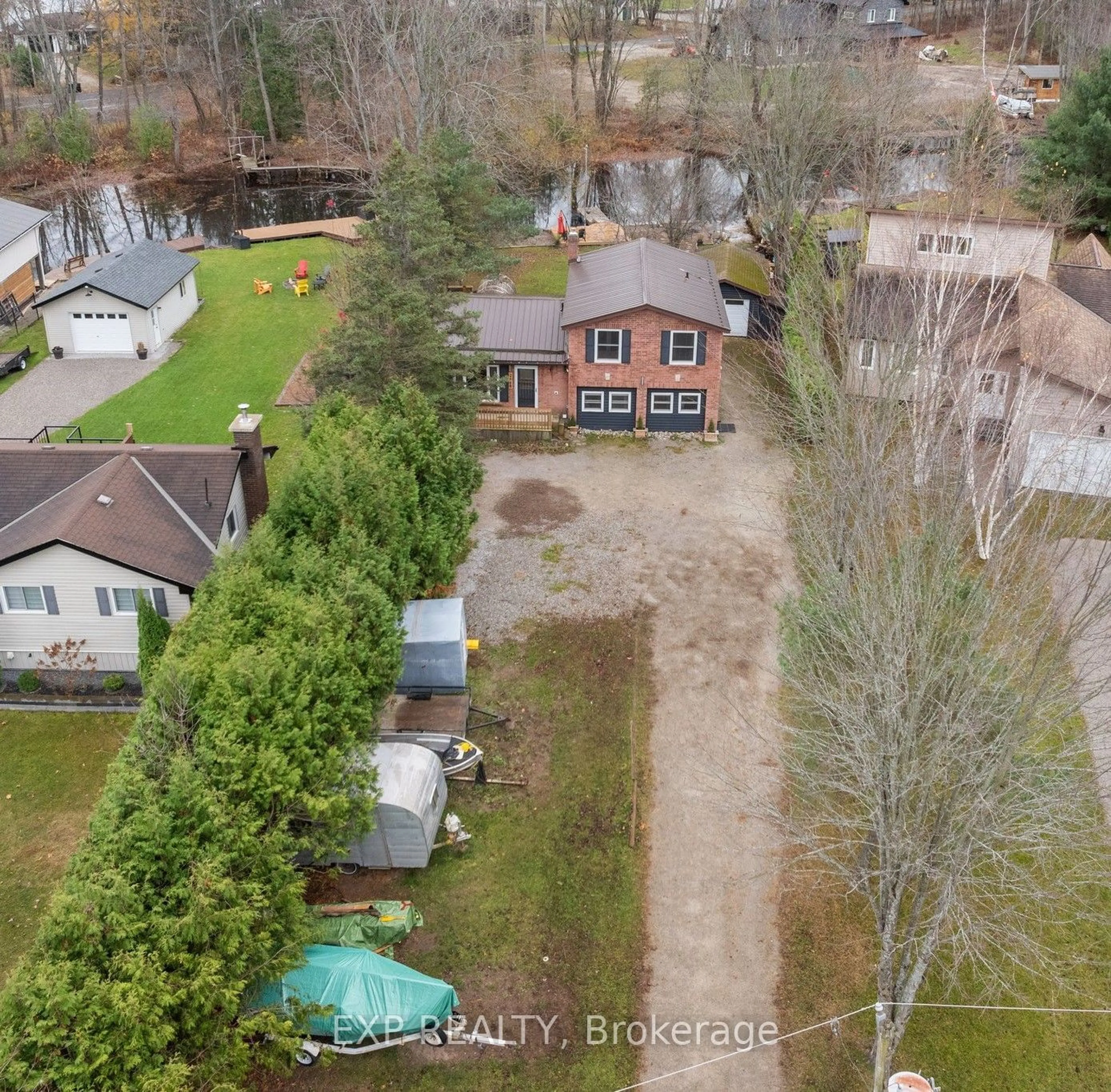 Frontside or backside of a home, the fenced backyard for 2668 Westshore Cres, Severn Ontario L3V 0V8