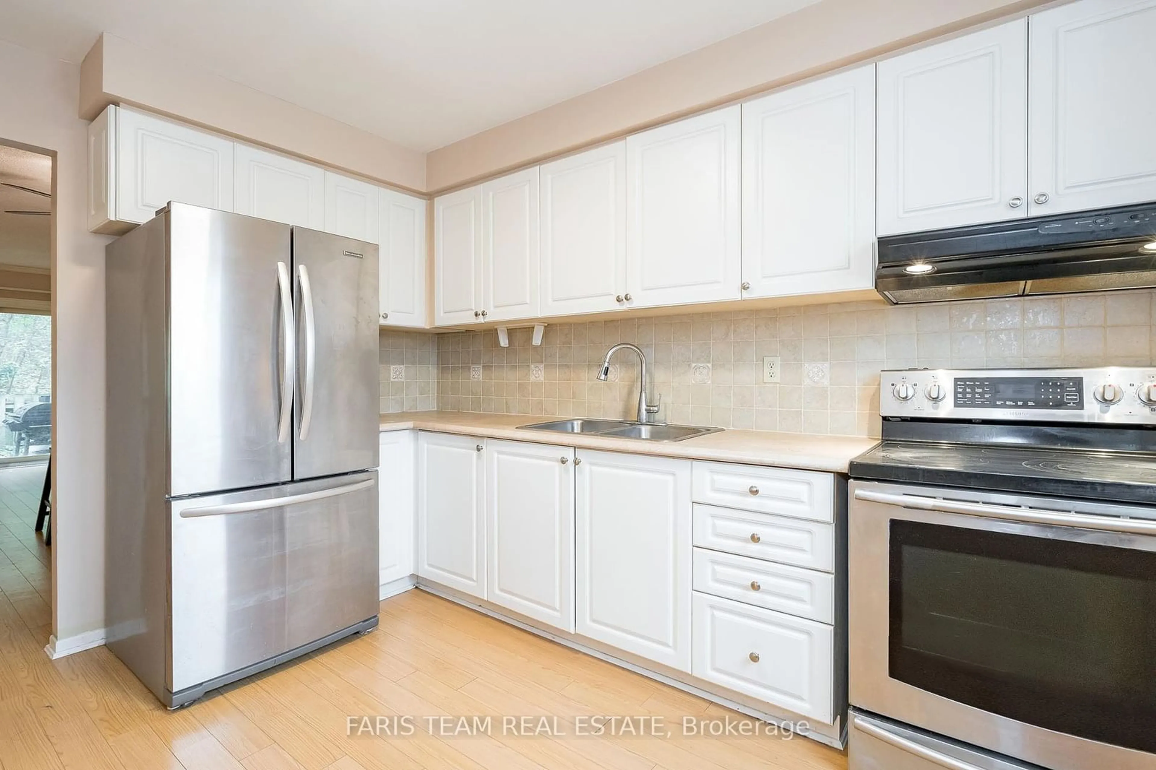 Standard kitchen, wood floors for 72 Adelaide St #48, Barrie Ontario L4N 3T5