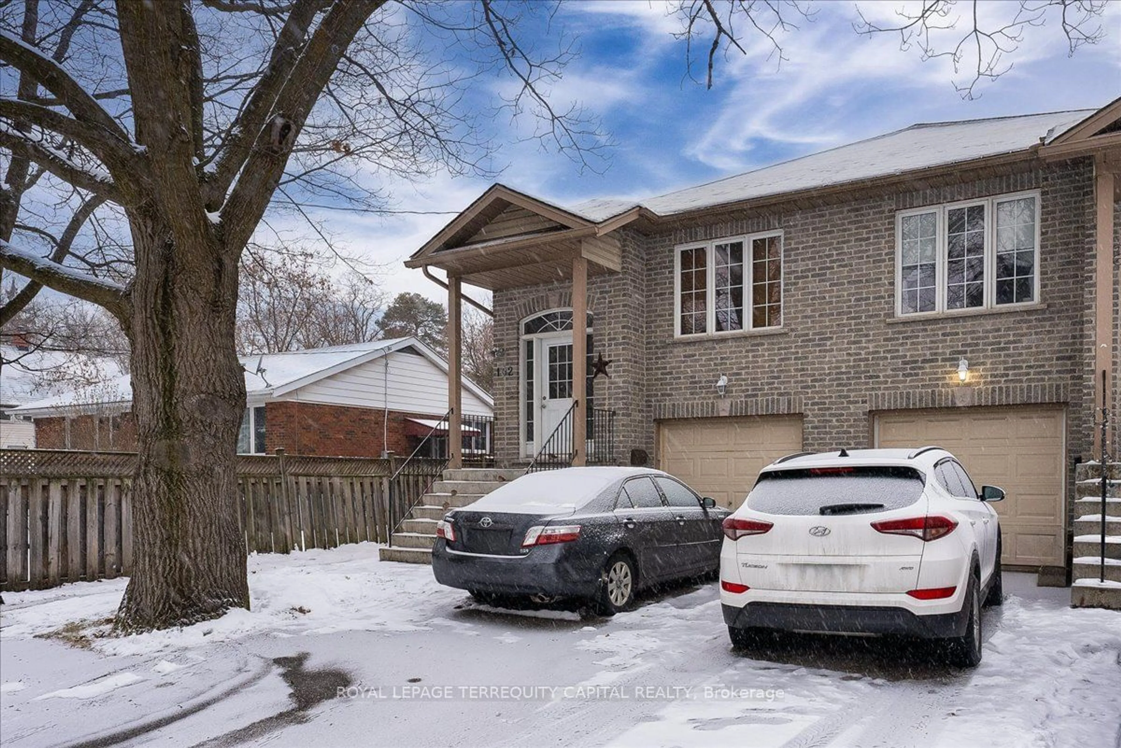 A pic from exterior of the house or condo, the street view for 102 Henry St, Barrie Ontario L4N 1C8