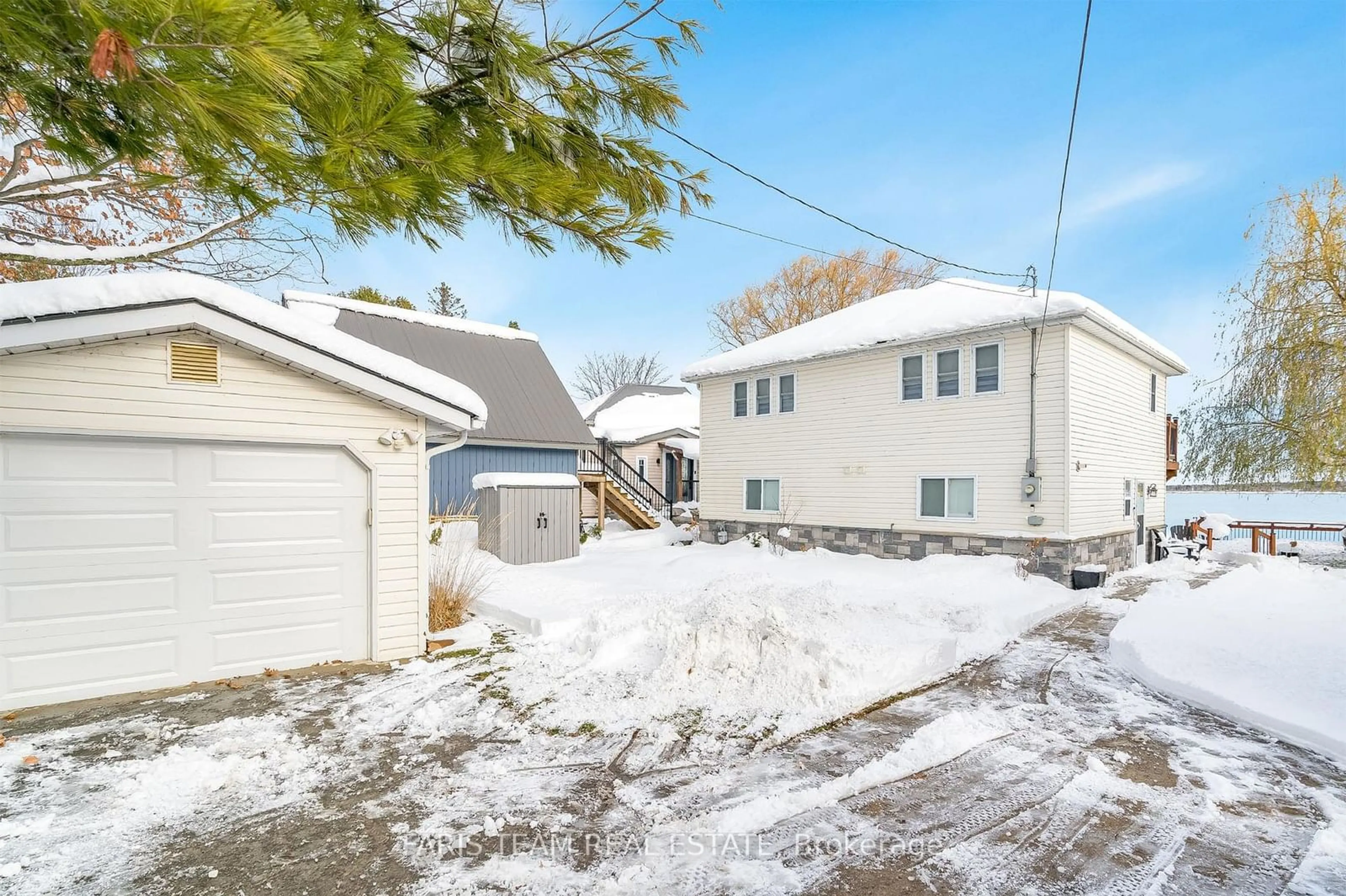 A pic from exterior of the house or condo, the fenced backyard for 282 Robins Point Rd, Tay Ontario L0K 2A0