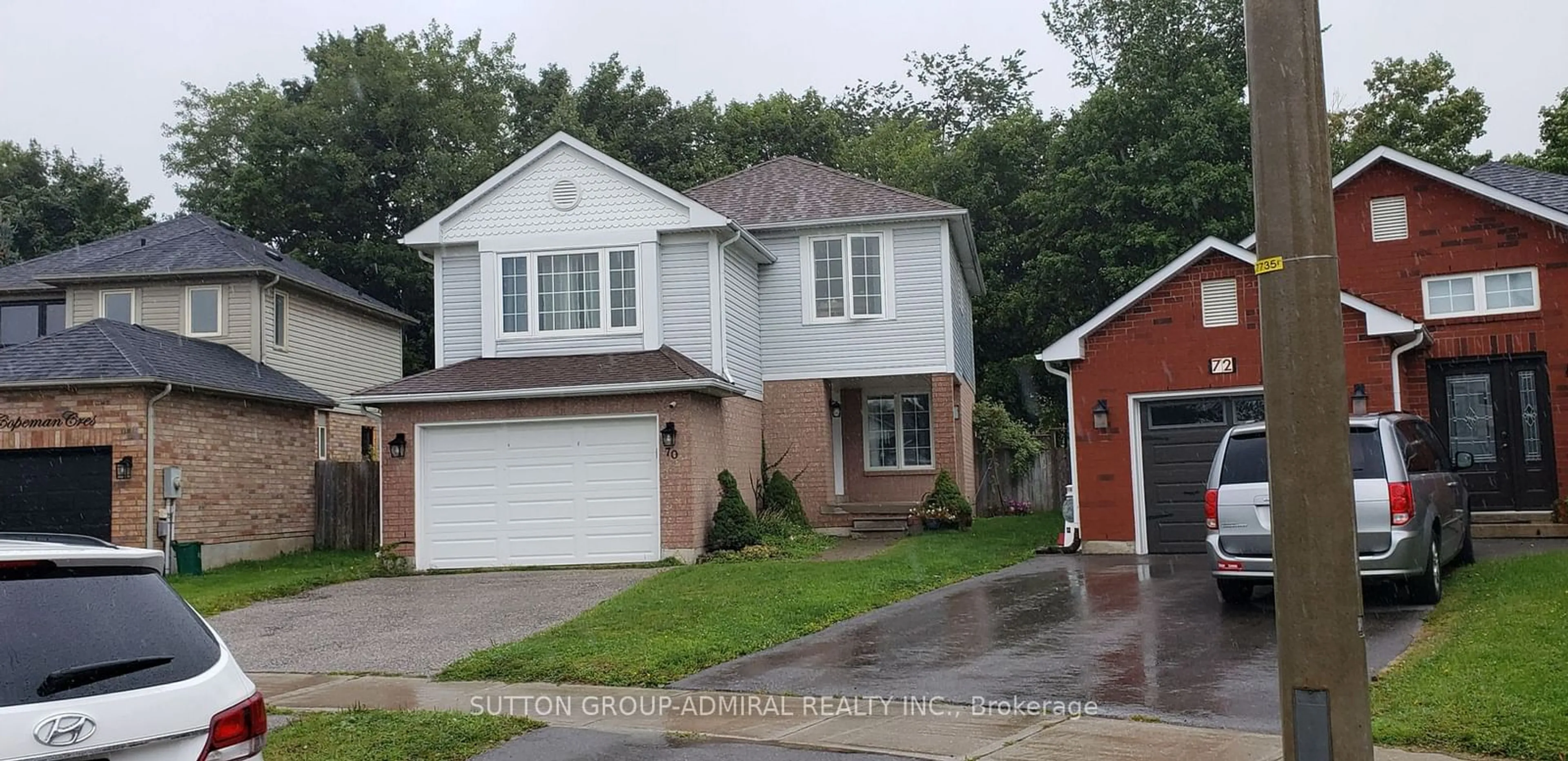 Frontside or backside of a home, the street view for 70 Copeman Cres, Barrie Ontario L4W 8B4