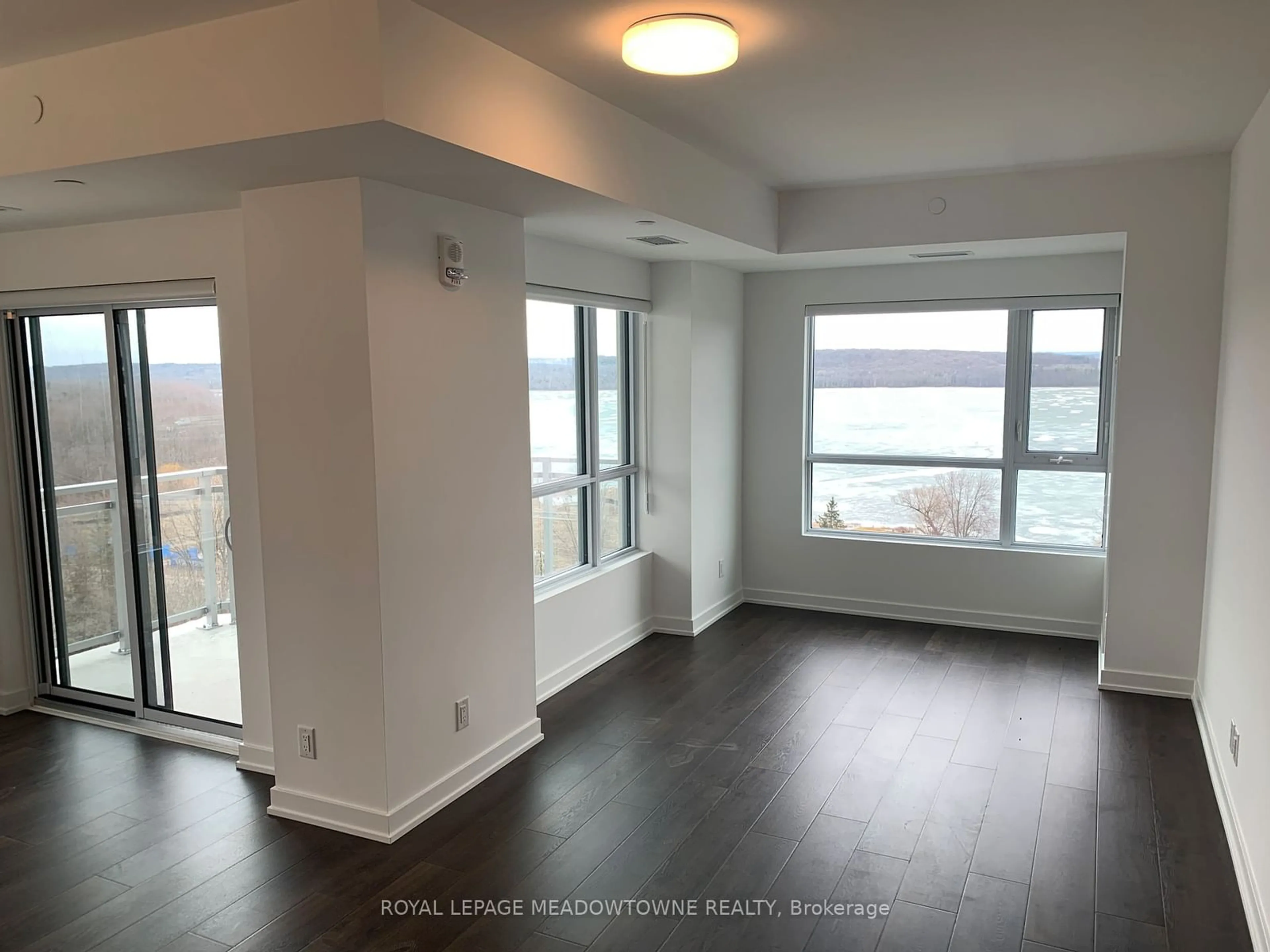 A pic of a room, wood floors for 56 Lakeside Terr #705, Barrie Ontario L4M 0L4