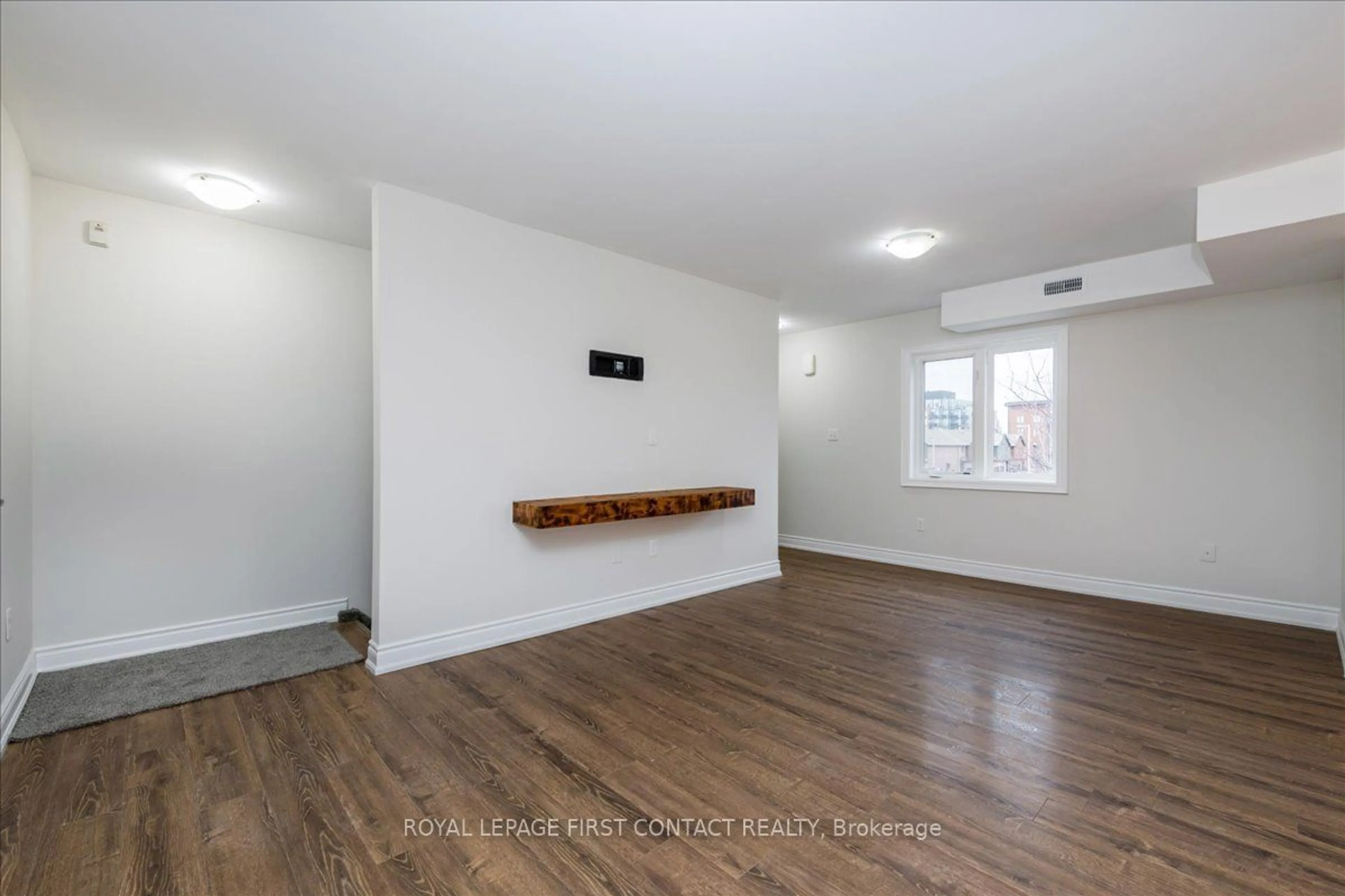 A pic of a room, wood floors for 35 Madelaine Dr #4, Barrie Ontario L9J 0G8