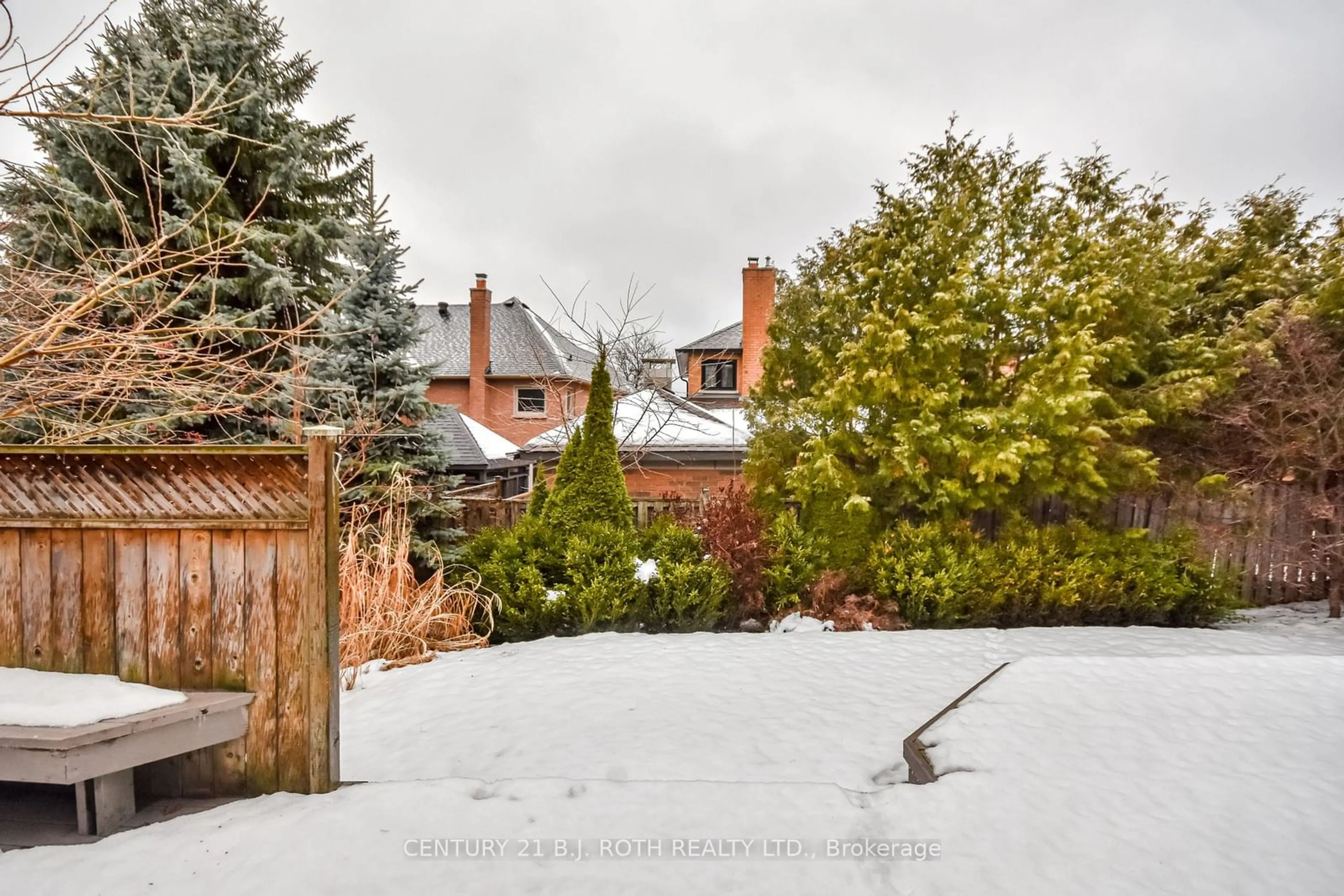 Frontside or backside of a home, the fenced backyard for 58 Brushwood Cres, Barrie Ontario L4N 7G6