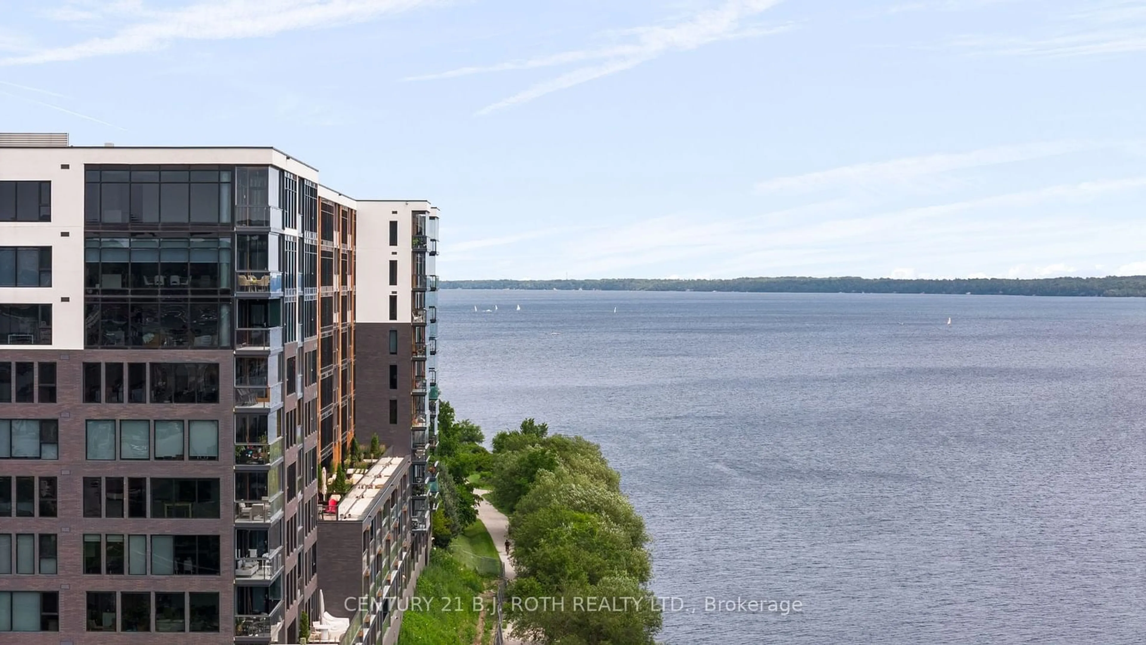 A pic from outside/outdoor area/front of a property/back of a property/a pic from drone, water/lake/river/ocean view for 185 DUNLOP St #523, Barrie Ontario L4M 1B2