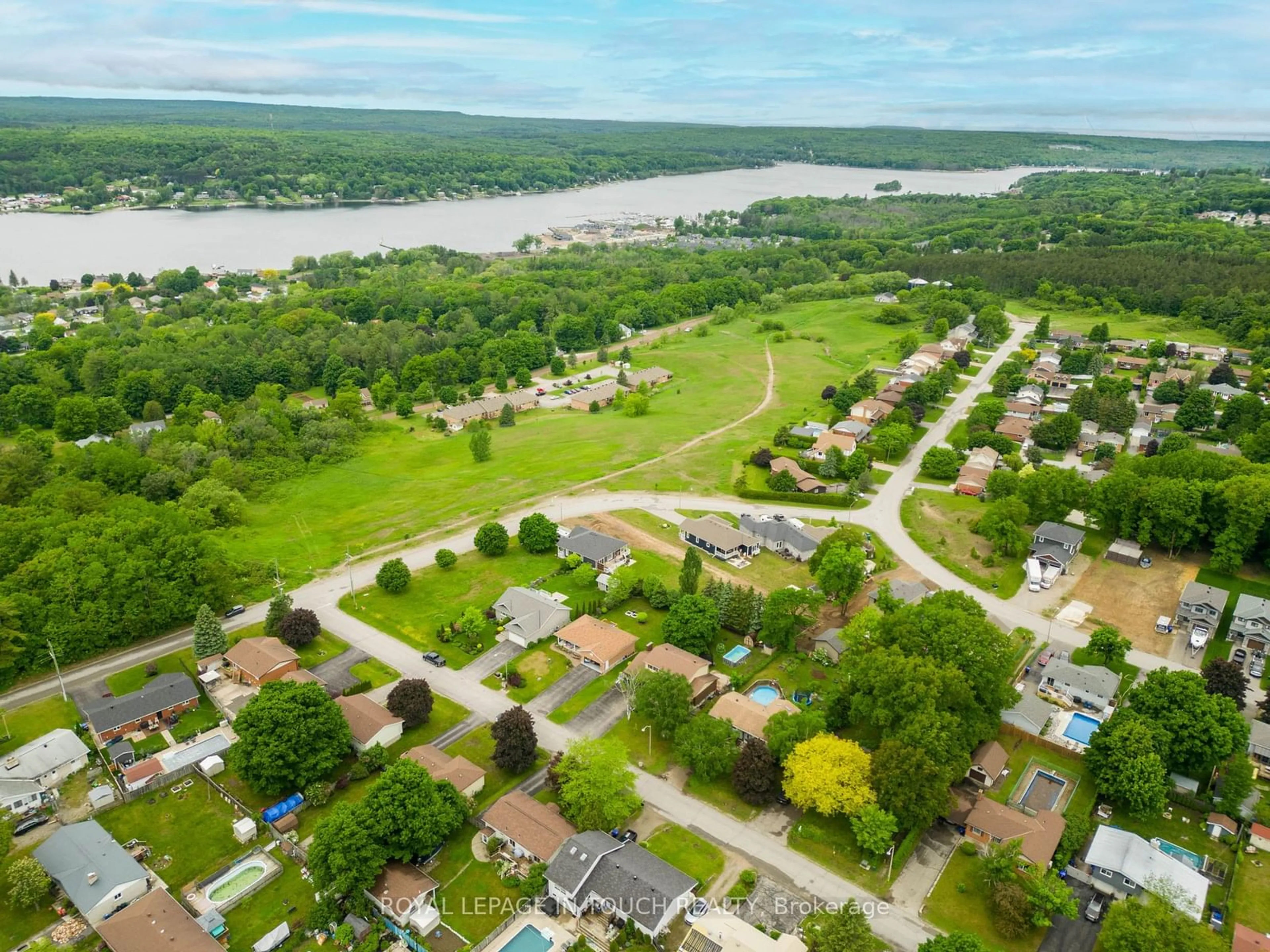 A pic from outside/outdoor area/front of a property/back of a property/a pic from drone, water/lake/river/ocean view for 11 Hill Top Dr, Penetanguishene Ontario L9M 1H7