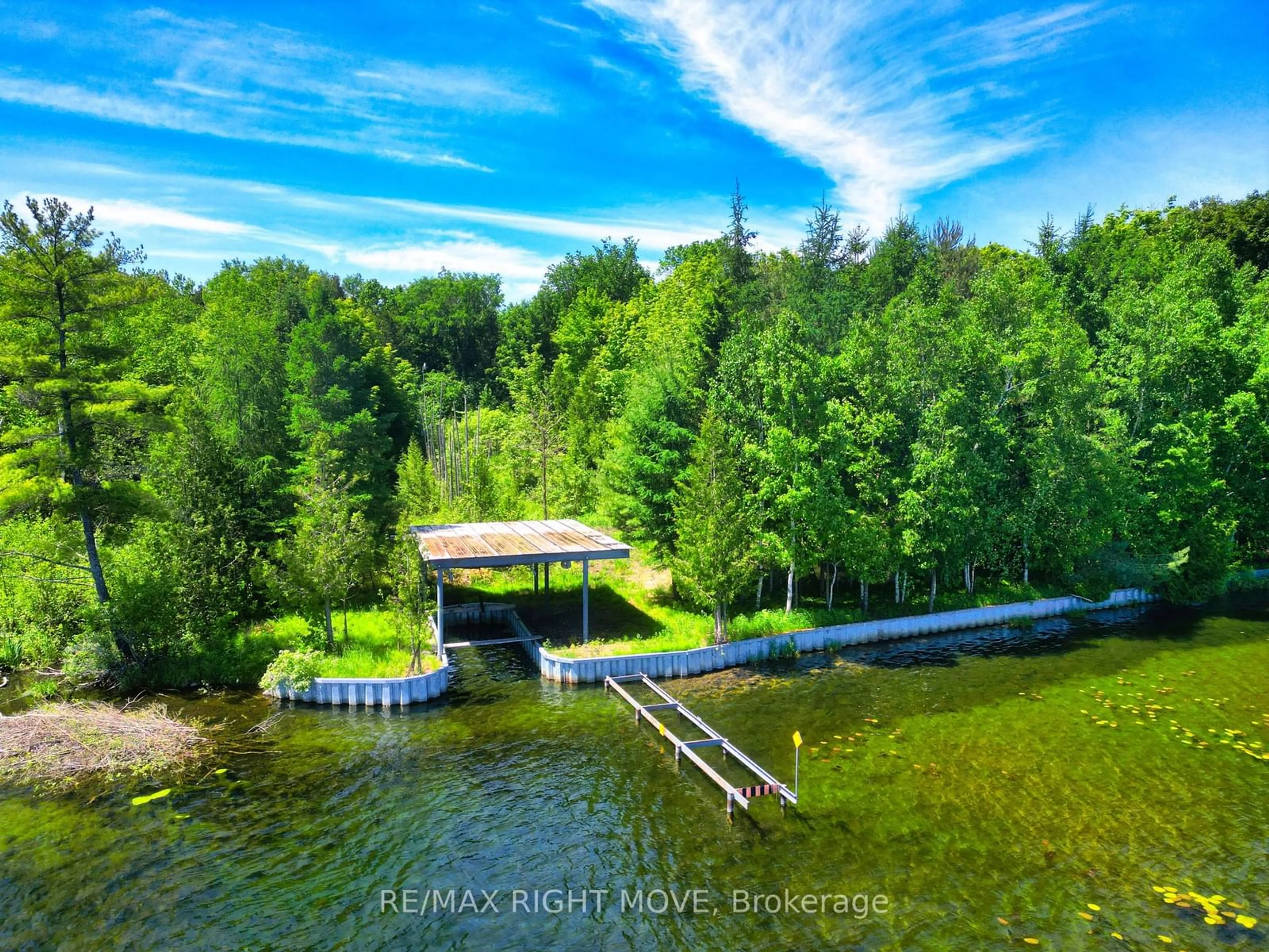 A pic from outside/outdoor area/front of a property/back of a property/a pic from drone, water/lake/river/ocean view for 9 Beach Rd, Oro-Medonte Ontario L3V 0R9