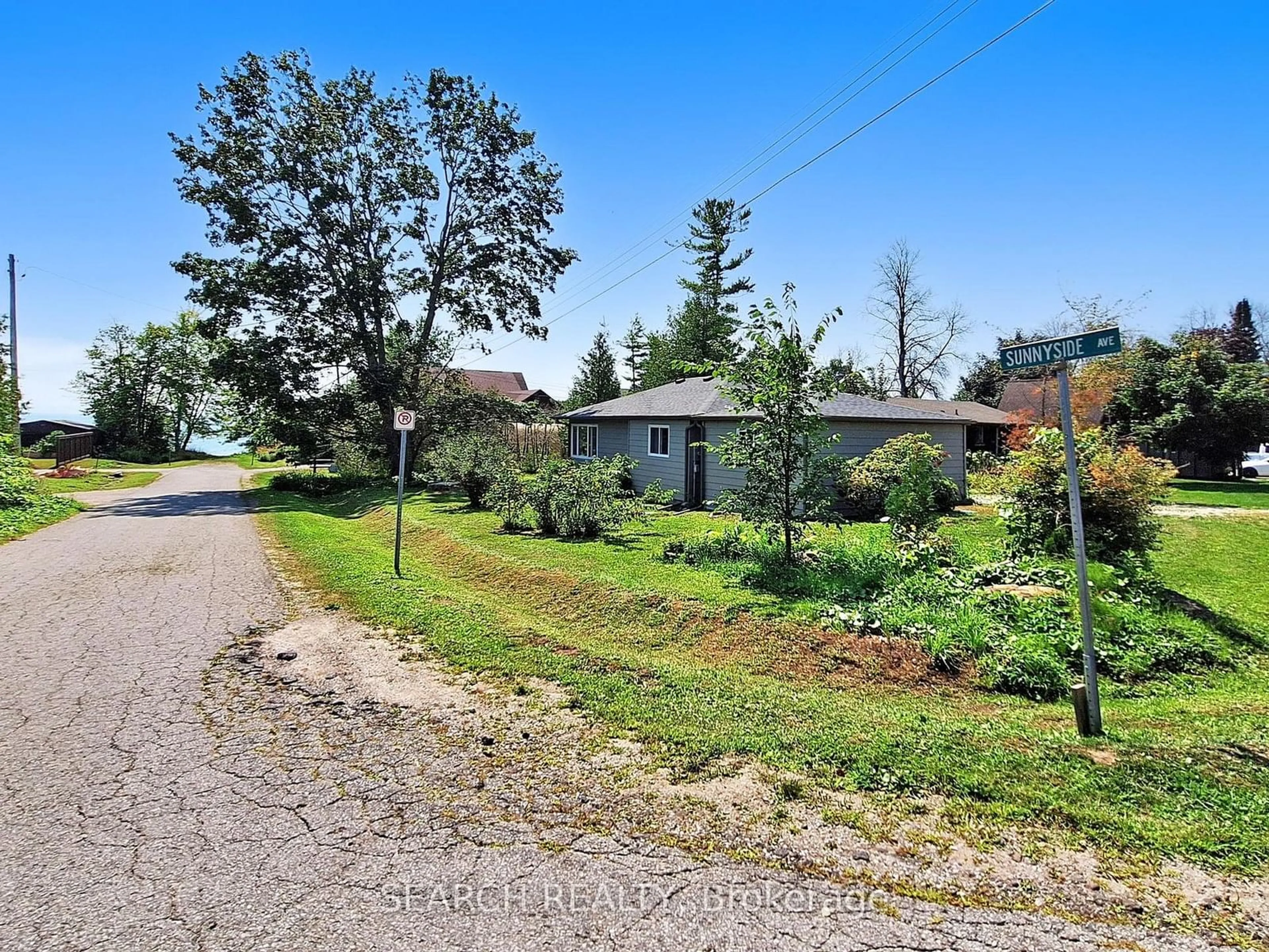 A pic from outside/outdoor area/front of a property/back of a property/a pic from drone, street for 71 Lakeshore Rd, Oro-Medonte Ontario L0L 2E0